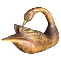 Cigno vintage intagliato a mano con dettagli in ottone