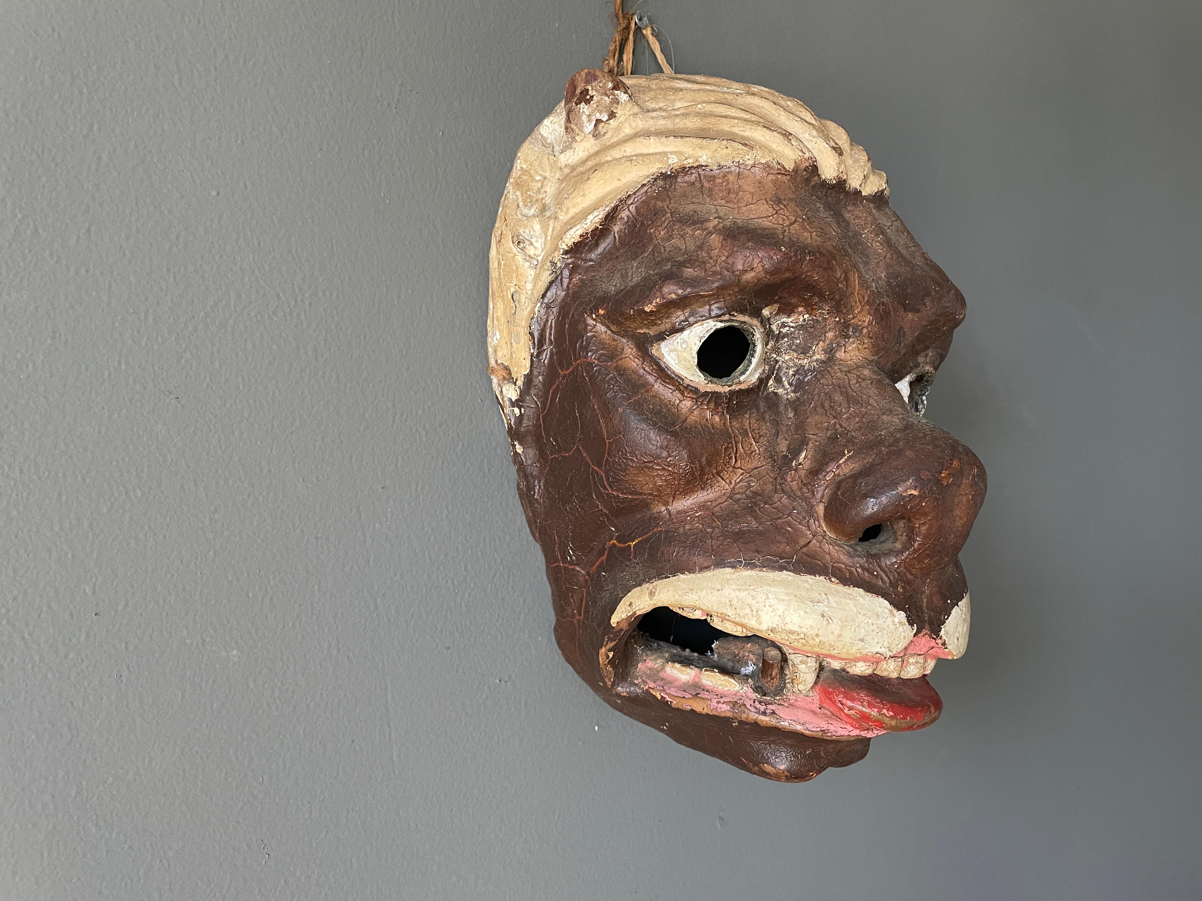 Vintage hand carved tribal ceremonial mask. A one of a kind conversation piece in any room it's placed in.