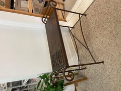 Vintage Hand-Carved Wood and Wrought Iron Console Table with Tribal Motifs