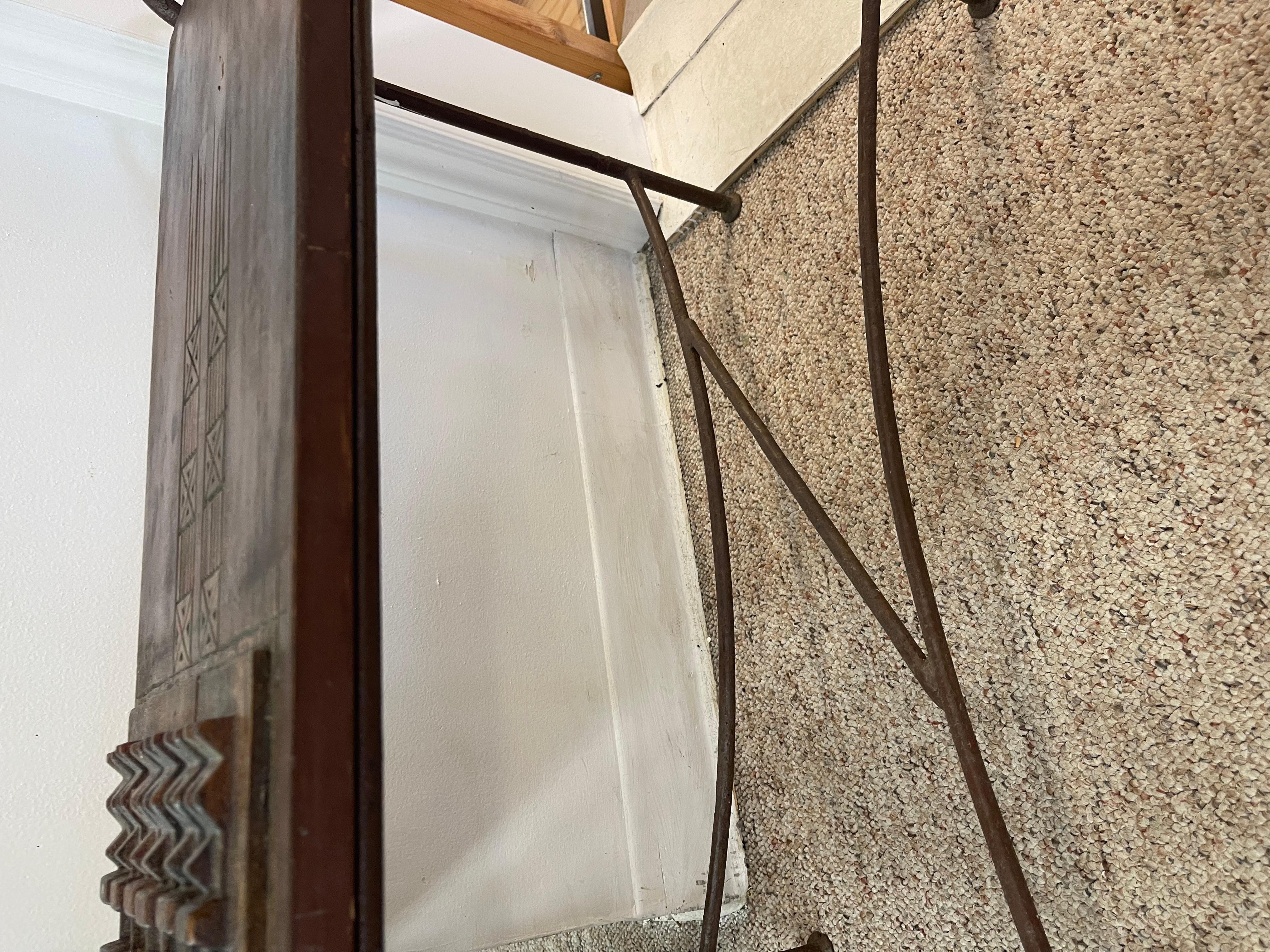 Vintage Hand-Carved Wood and Wrought Iron Console Table with Tribal Motifs In Good Condition For Sale In Seattle, WA