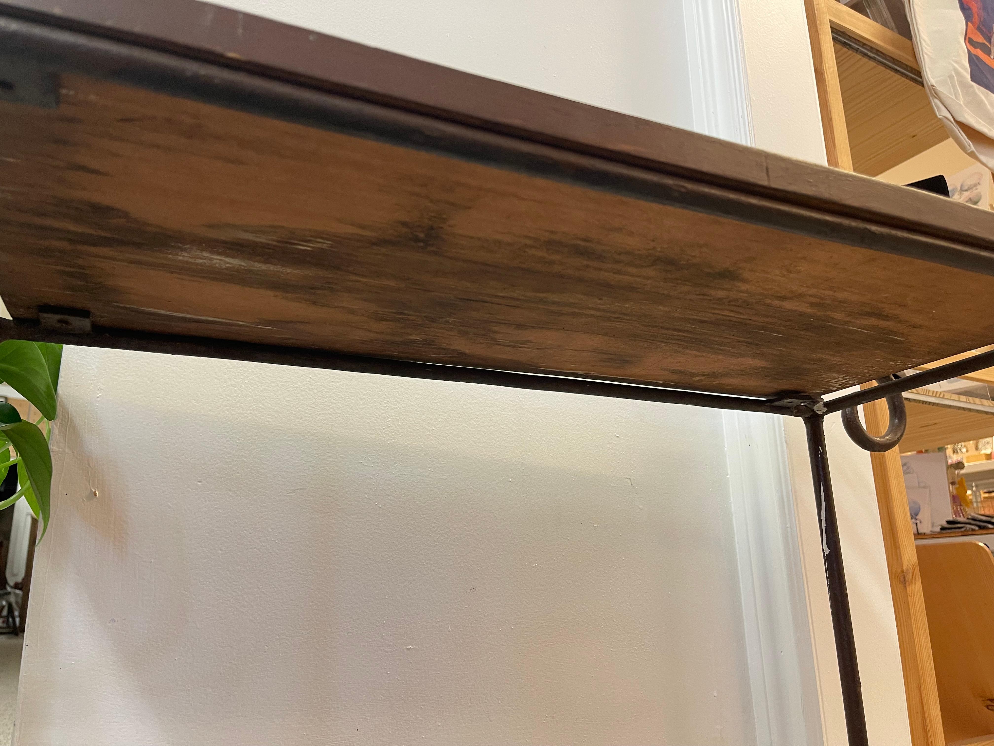 Vintage Hand-Carved Wood and Wrought Iron Console Table with Tribal Motifs For Sale 1