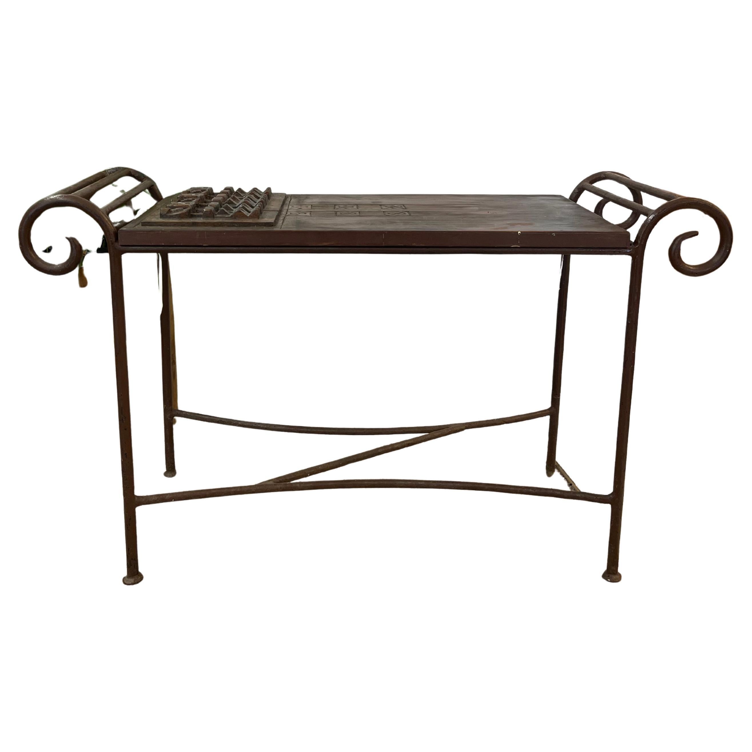 Vintage Hand-Carved Wood and Wrought Iron Console Table with Tribal Motifs For Sale