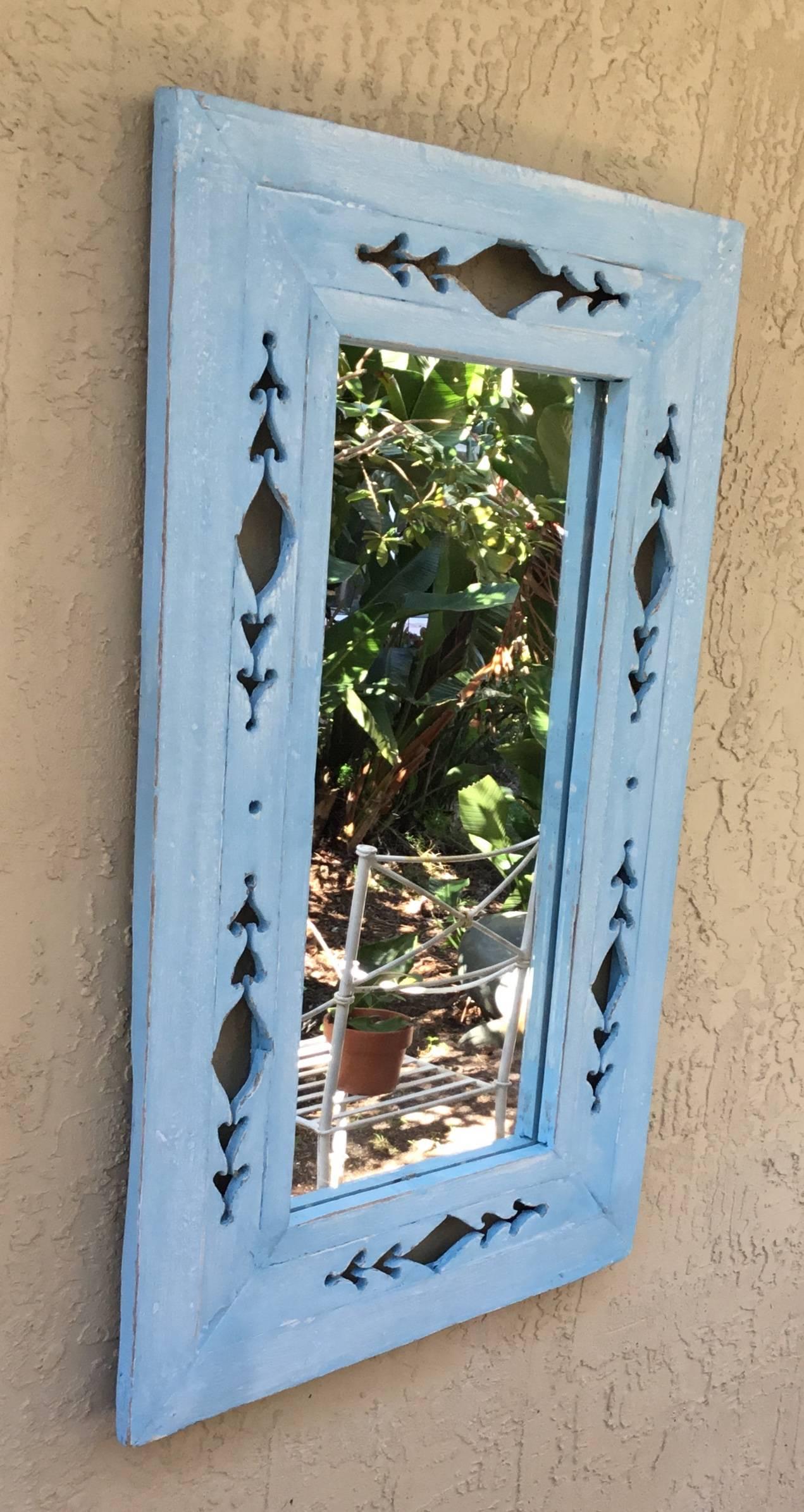 Fantastic wood mirror artistically hand carve with repeated hearts motifs all around and painted with flat light blue-turquoise color. Great decorative wall hanging.
Actual size: 12”.5 x 27”.
One more mirror available.