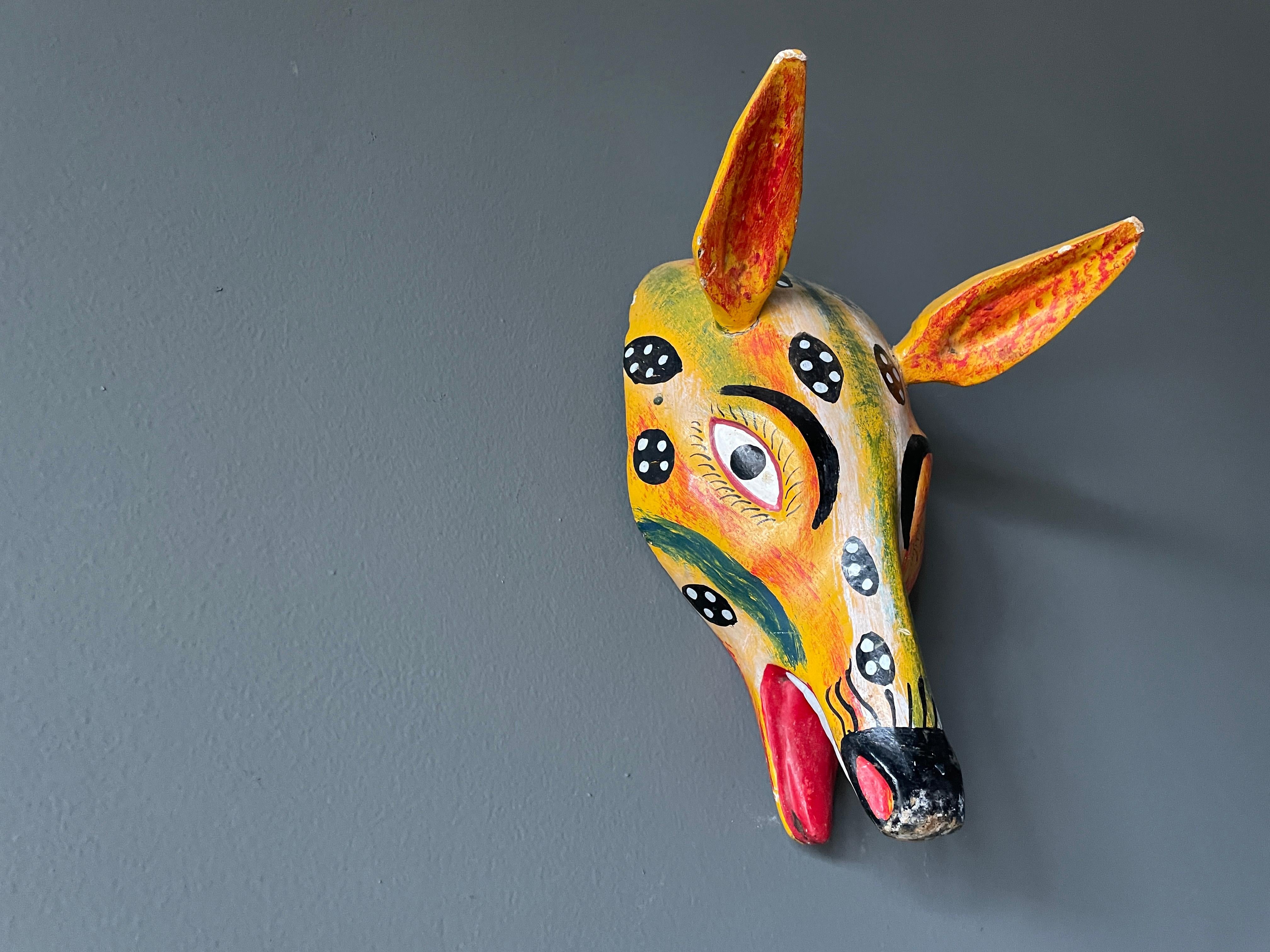 Vintage hand carved and painted tribal mask. A wonderful accent piece for any room.