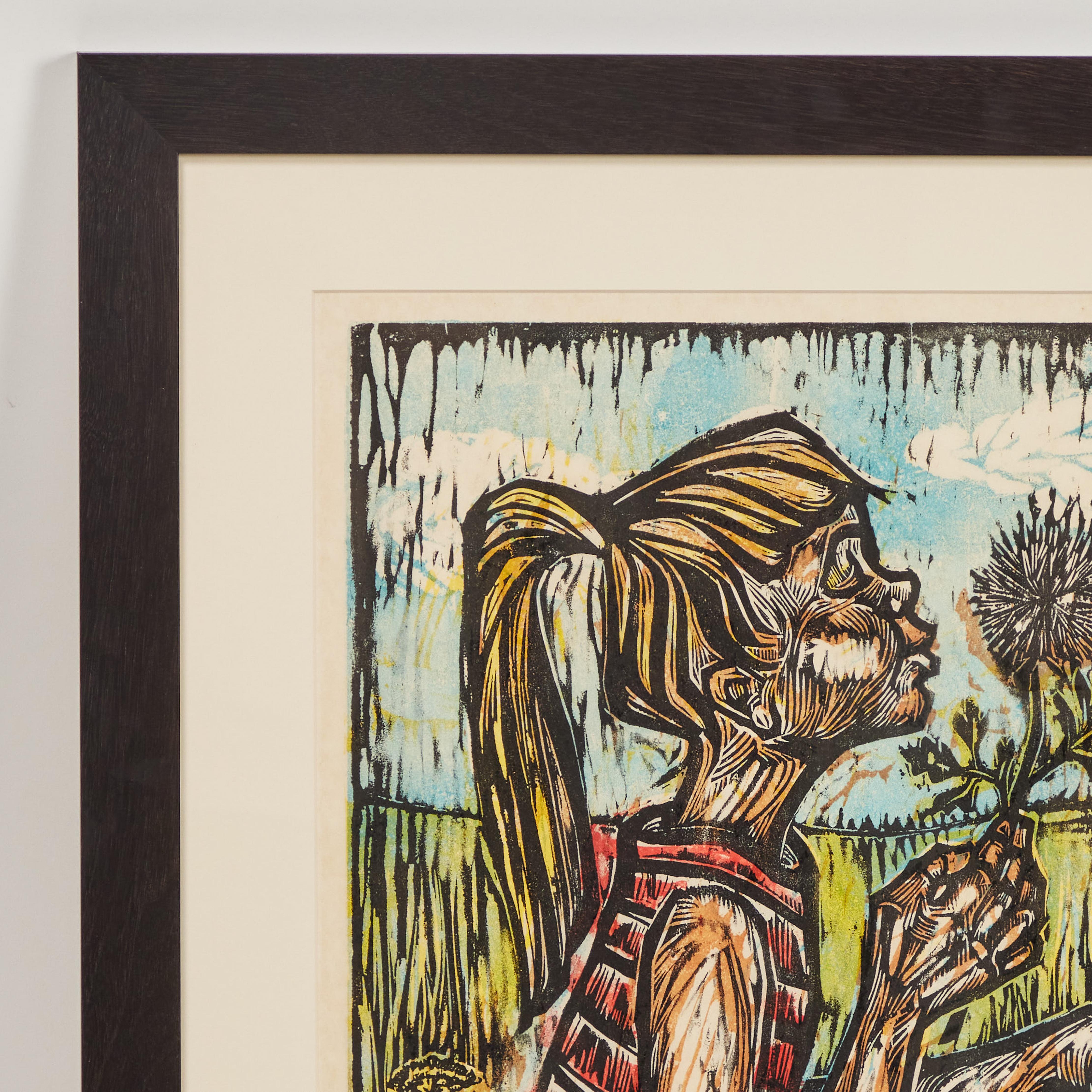 Happy and full of joy, this vintage woodcut of a seated little girl titled 'Wish'n Puff' is a complete delight. This charming hand-colored piece is signed by the artist Sister Mary Charles and numbered 60/60. It has been newly framed and ready to