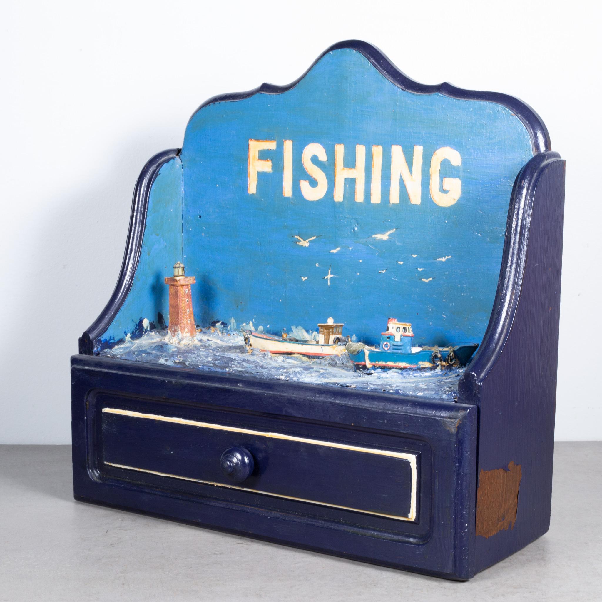 About:

A vintage Handcrafted and painted fishing diorama with drawer. 

 Creator: Unknown. Made in The Netherlands.
 Date of manufacture: circa 1940-1950.
 Materials and techniques: Wood, Paint.
 Condition: Good. Wear consistent with age and