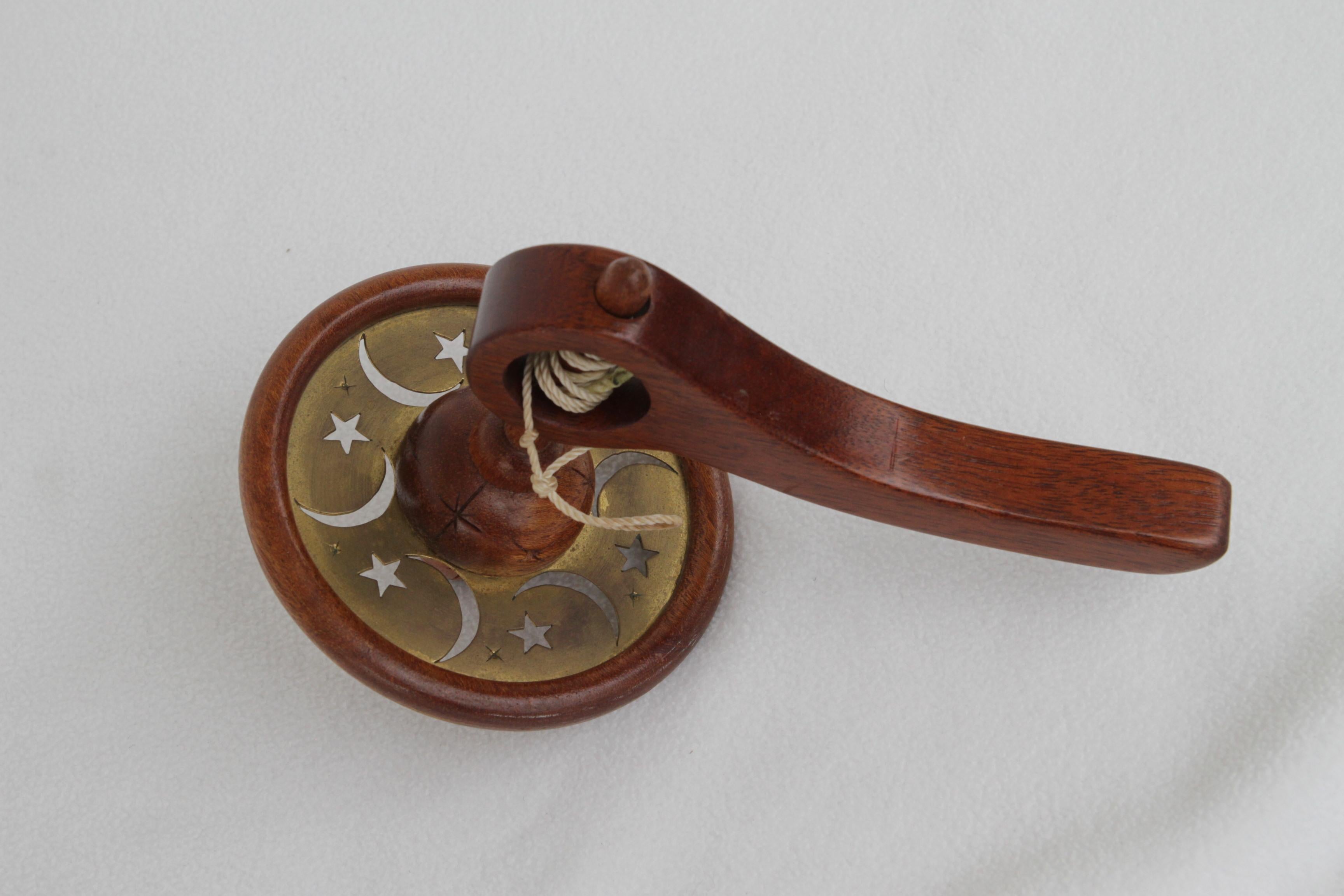 Vintage Hand Cranked Wooden Toy w Pull String beautifully crafted vintage wooden toy features a classic hand-crank mechanism paired with a pull string, showcasing traditional toy-making craftsmanship. Made from polished hardwood, the toy includes a