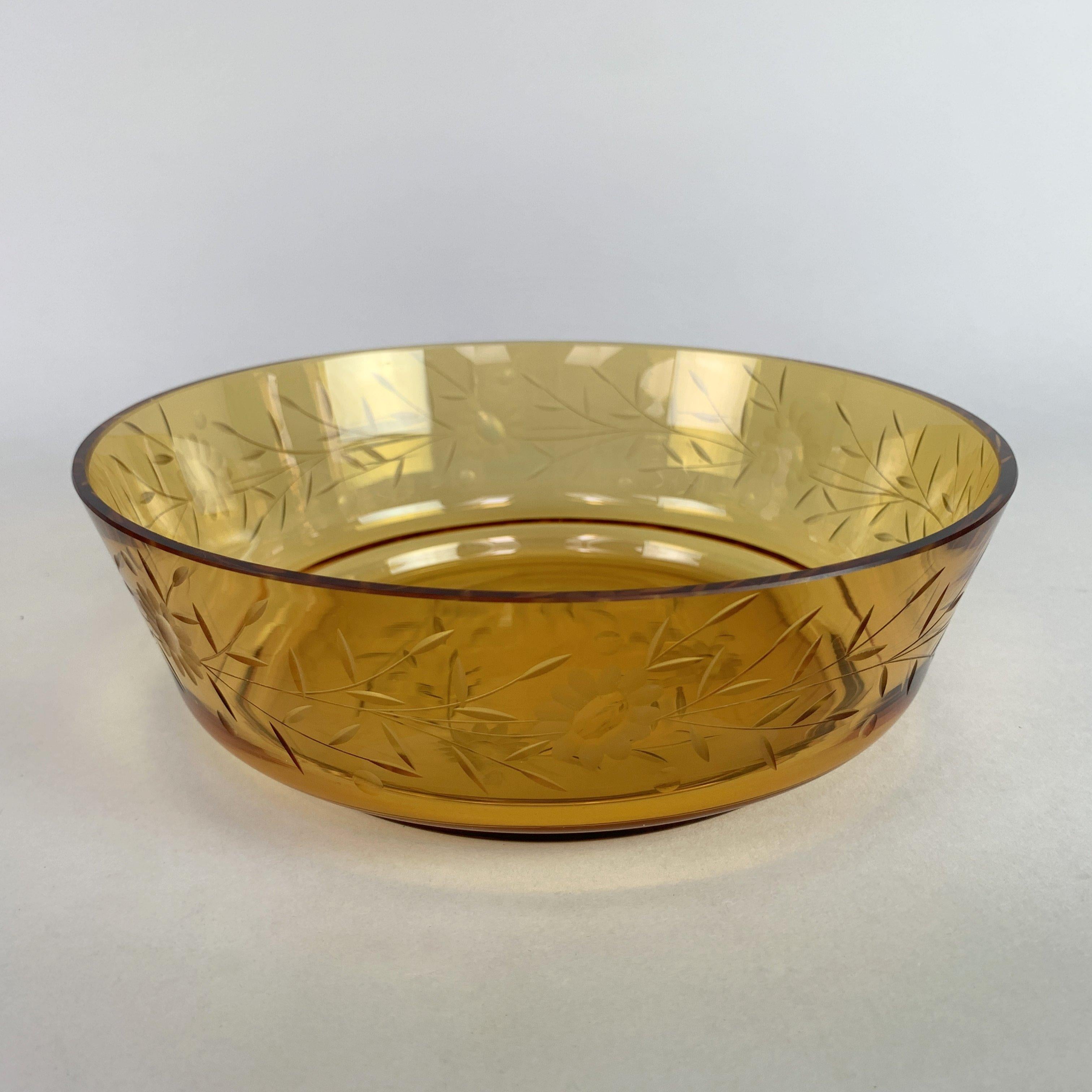 Bohemian vintage handcut amber glass bowl. Very good vintage condition. The item is approximately 6,5 cm high and 20,7 cm wide.