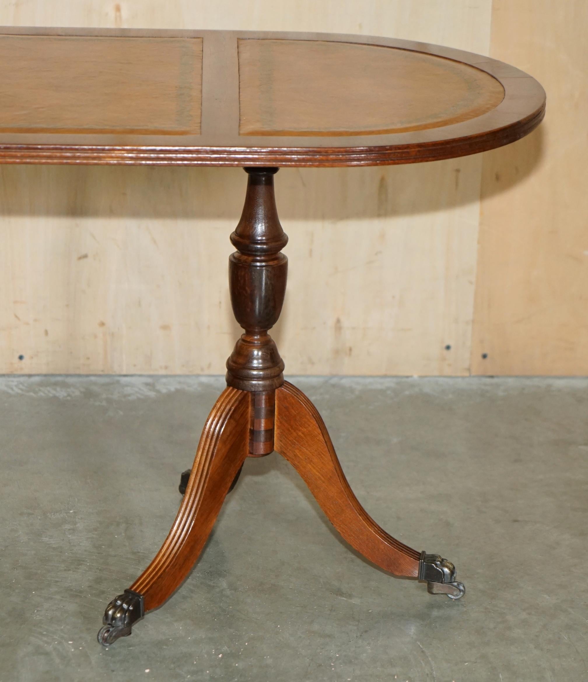 ViNTAGE HANDDYED AND AGED BROWN LEATHER OVAL COFFEE-TABLE MIT LION CASTORS im Angebot 6