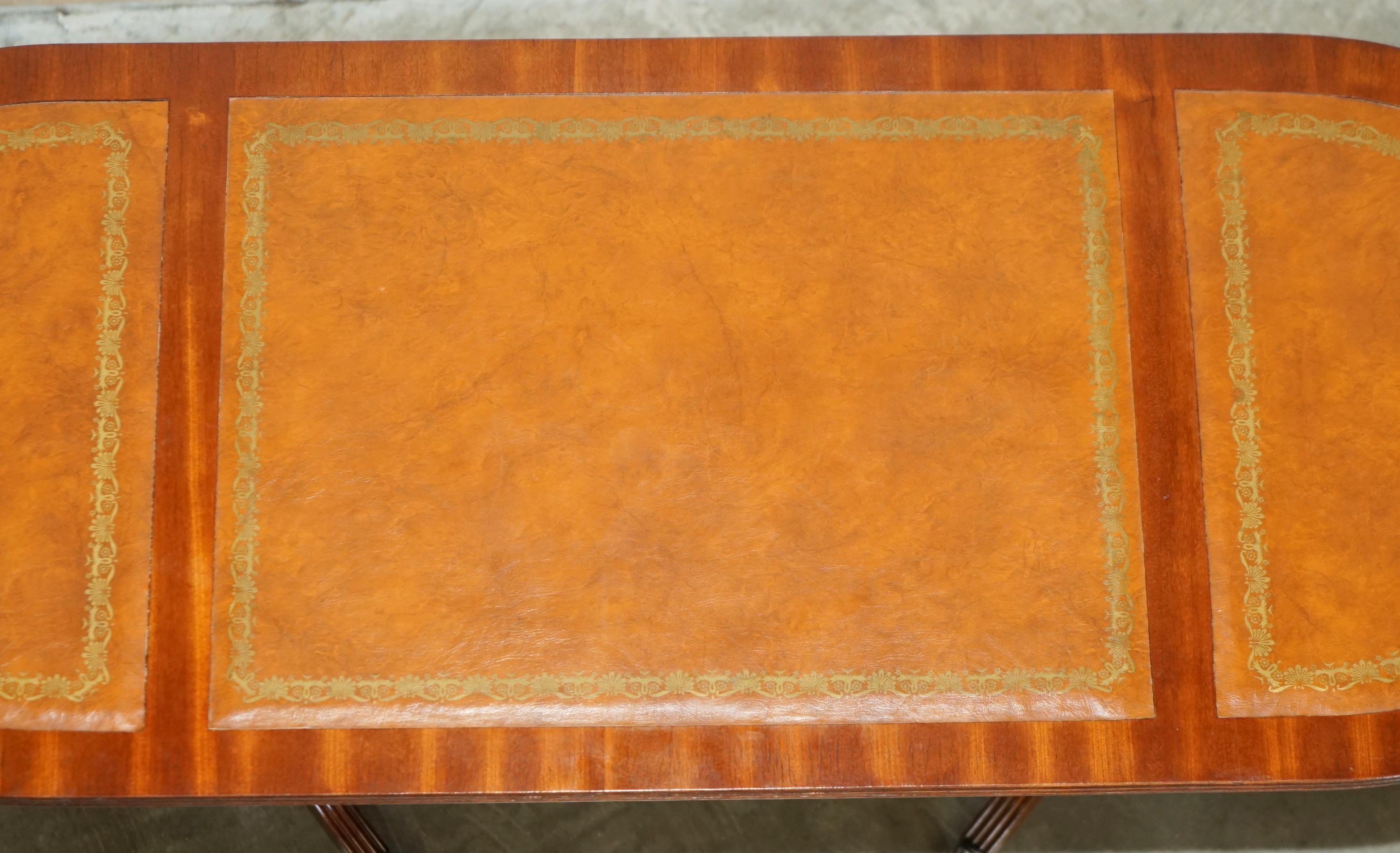ViNTAGE HAND DYED AND AGED BROWN LEATHER OVAL COFFEE TABLE WITH LION CASTORS For Sale 12