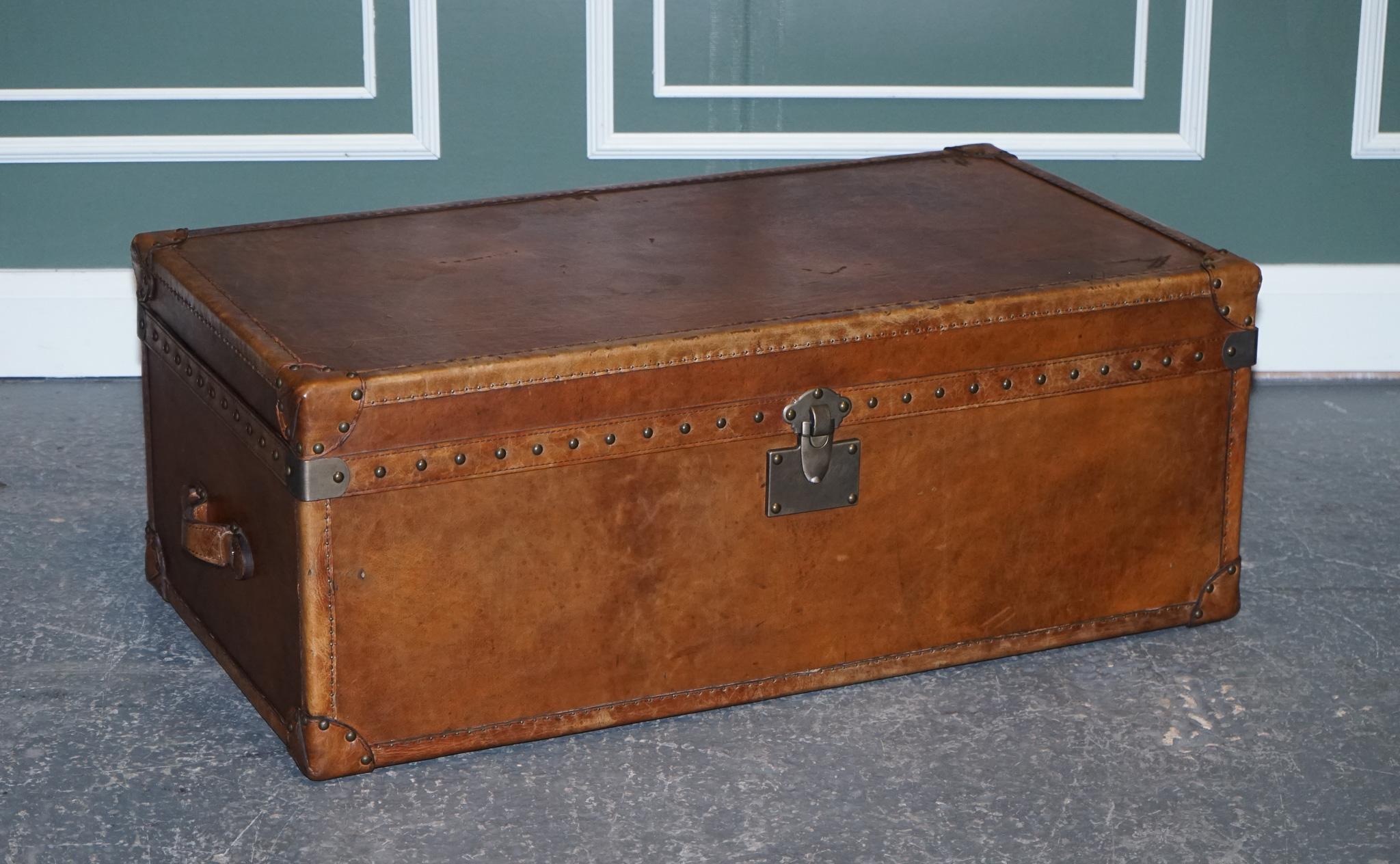 
We are delighted to present to you this Timothy Oulton Vintage Brown Leather Trunk.

A very good-looking trunk that can be used as a coffee table as well.
The leather has been stripped back and dyed serval times to get the lovely colour.
The