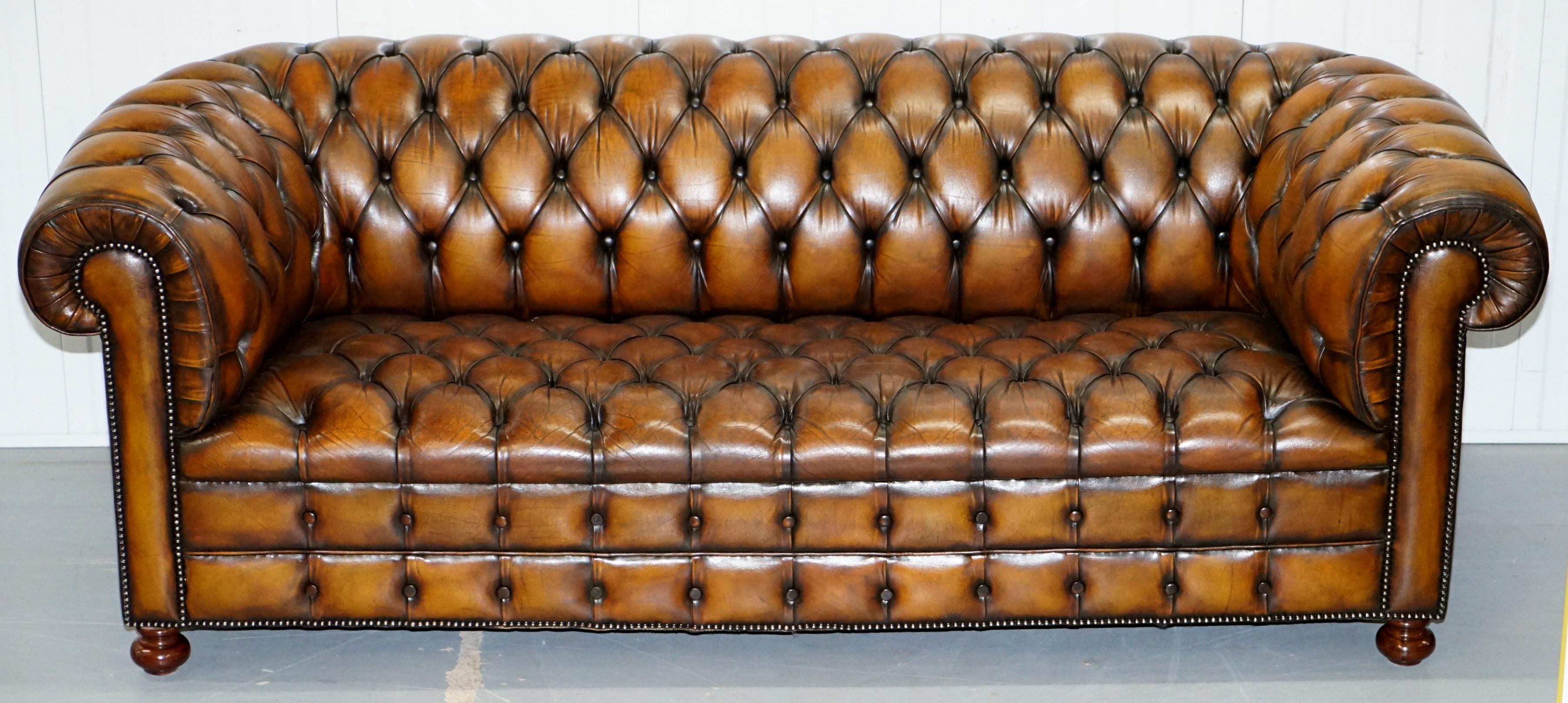 We are delighted to offer for sale this rare original vintage Whisky brown leather Chesterfield club sofa in newly restored condition with fully buttoned base 

This sofa is one of a pair, I have another which is exactly the same model going