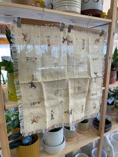 Vintage Hand-Embroidered Linen Tablecloth with Figural Motif and Fringe Border