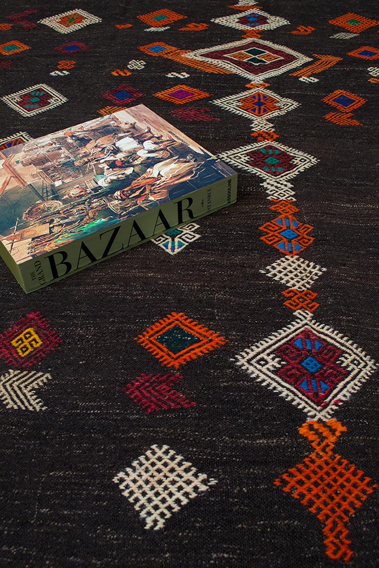 The beauty and artistry in our Kilims is revealed in the small details.
Take for example this Vintage piece that was created using natural un-dyed wool, mixed with goat hair and hand-embroidered with colorful symbols woven only by women as a way to