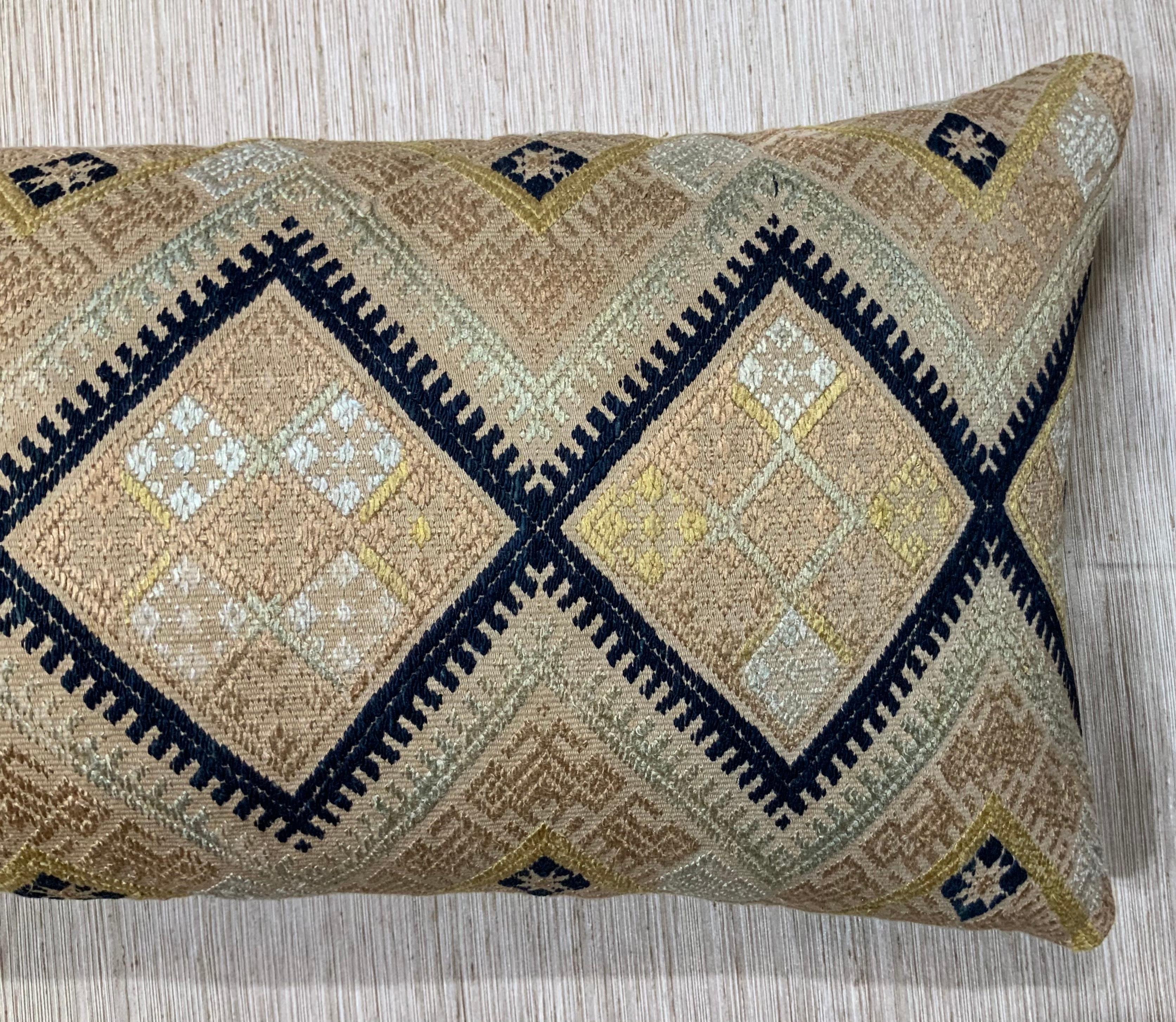 Pillow made of hand embroidery silk on cotton cream color background. geometric and motifs. Linen backing, fresh quality insert.
  