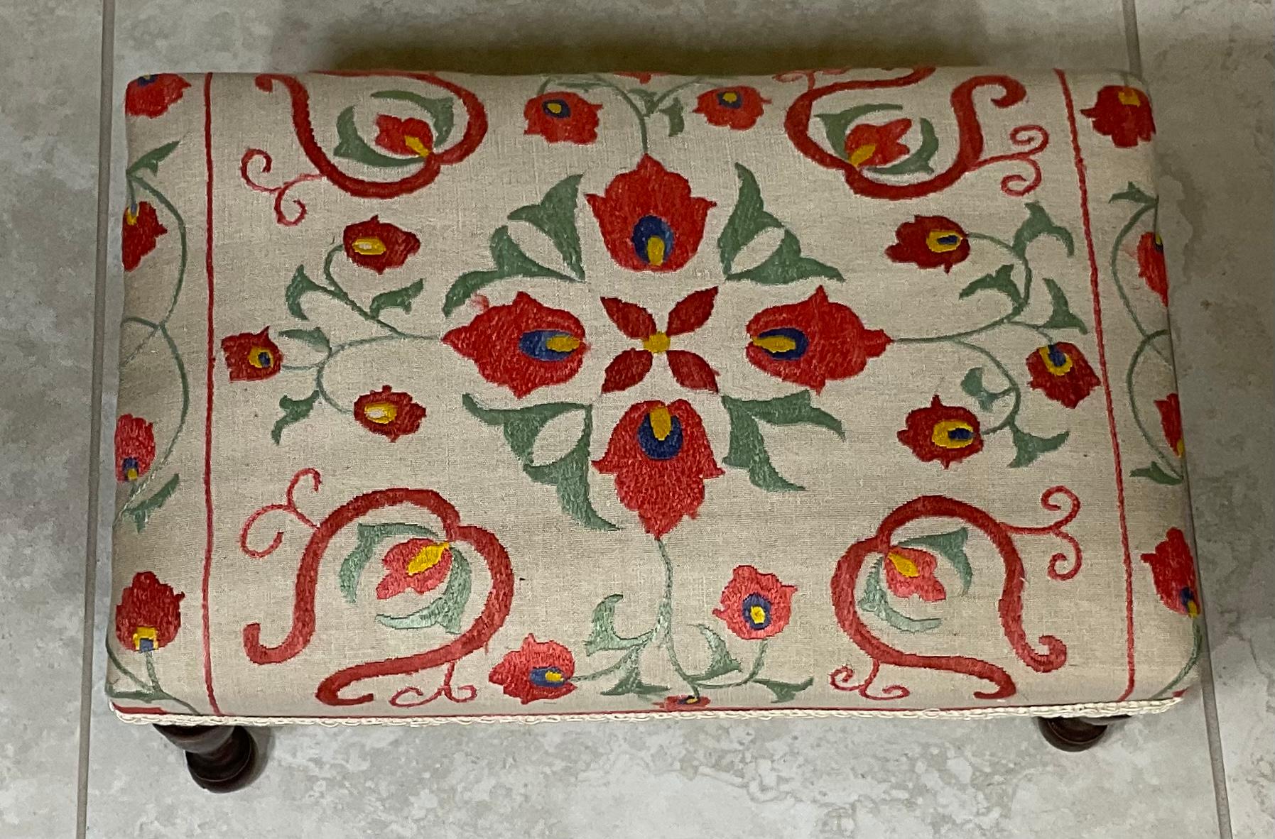 Elegant foot stool made wood, upholstered with beautiful vintage hand embroidery Suzani textile, great decorative stool.
    