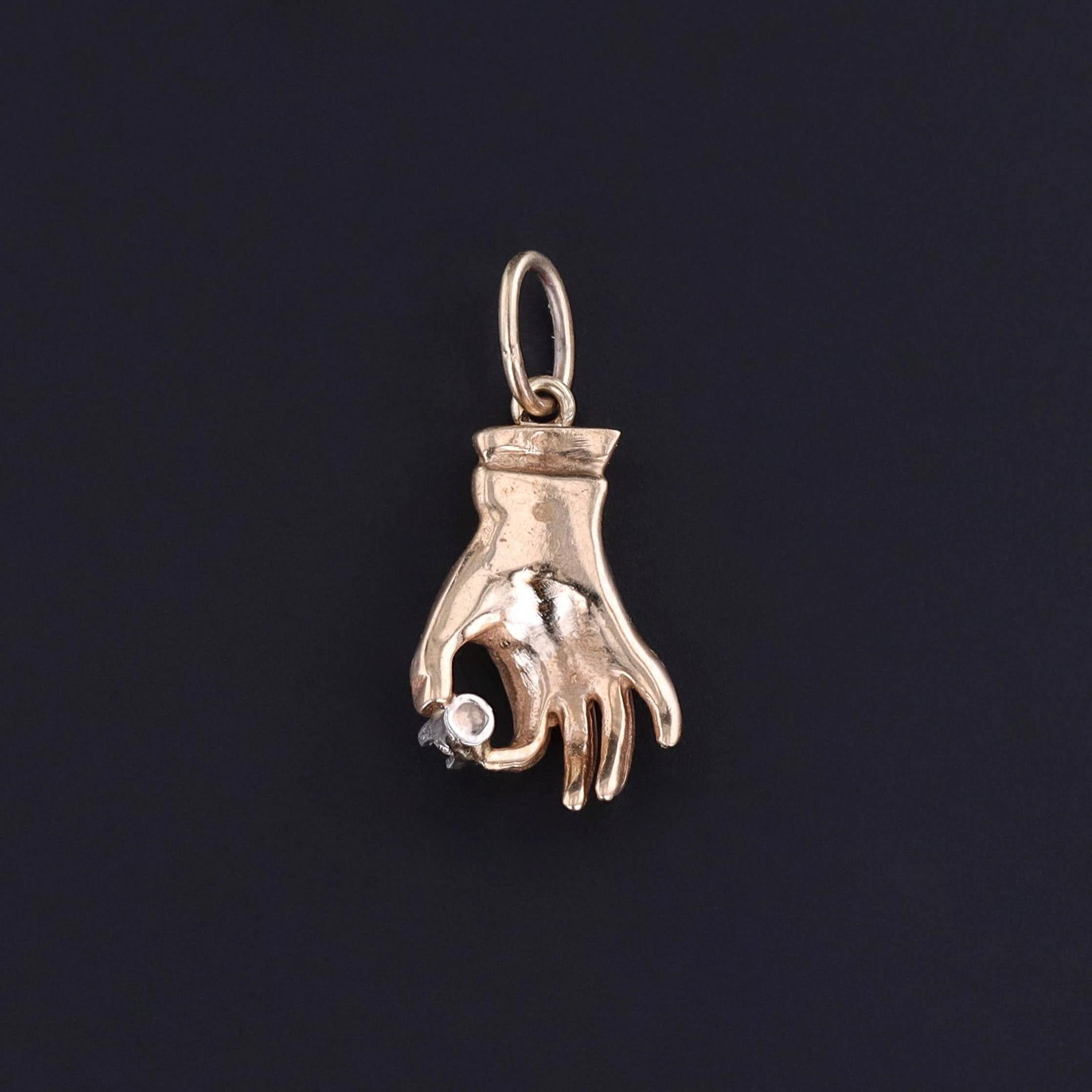 Retro Vintage Hand Holding Diamond of 12k Gold