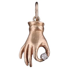 Vintage Hand Holding Diamond of 12k Gold