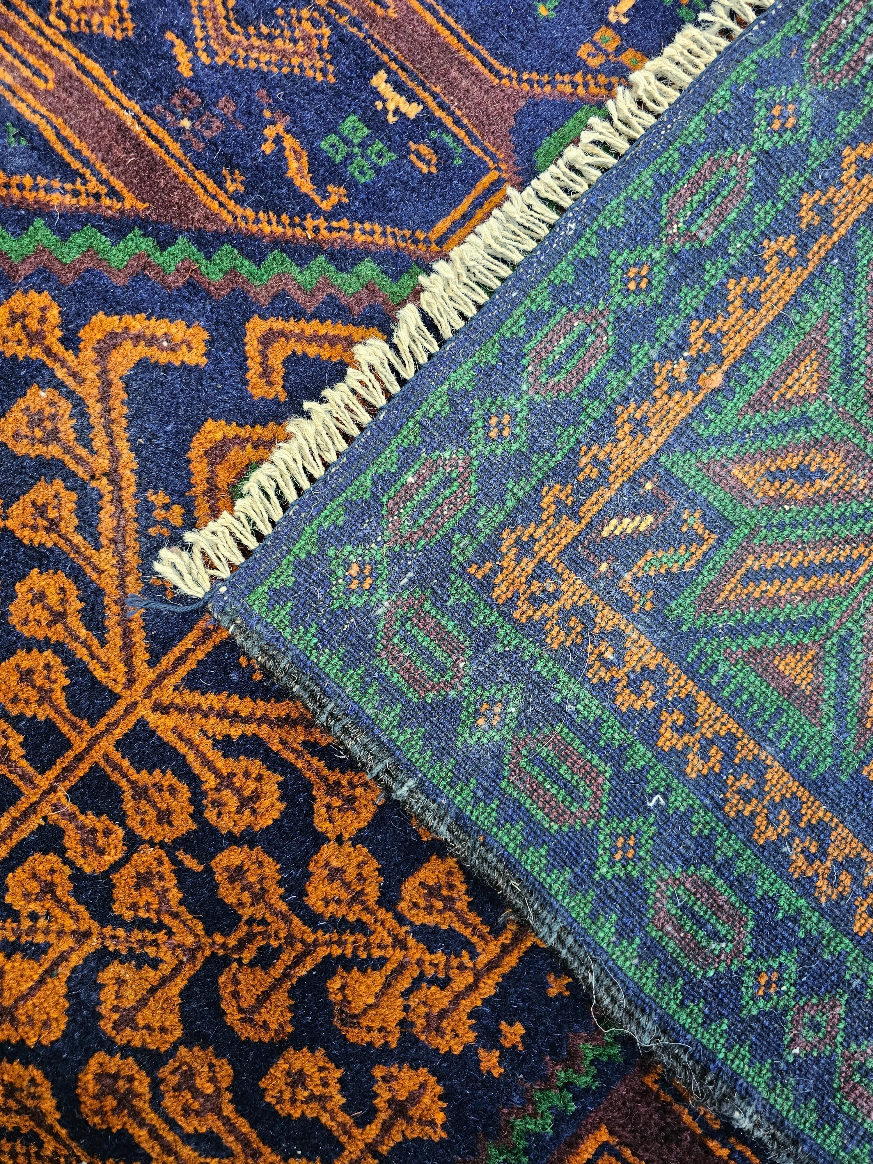Mid-20th Century Vintage Hand-Knotted Baluch Rug with golden and navy tones, Afghanistan 1950s For Sale