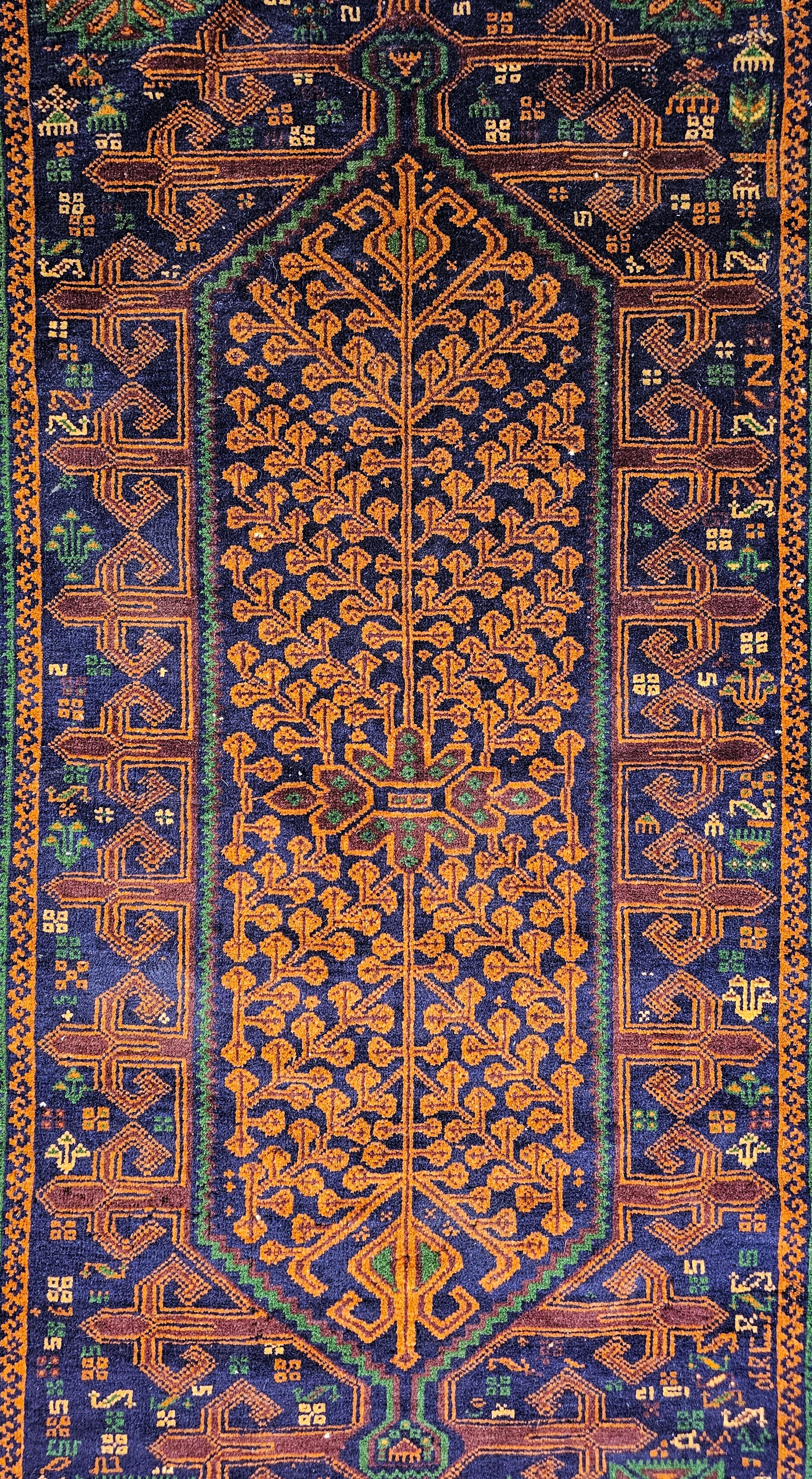 Wool Vintage Hand-Knotted Baluch Rug with golden and navy tones, Afghanistan 1950s For Sale