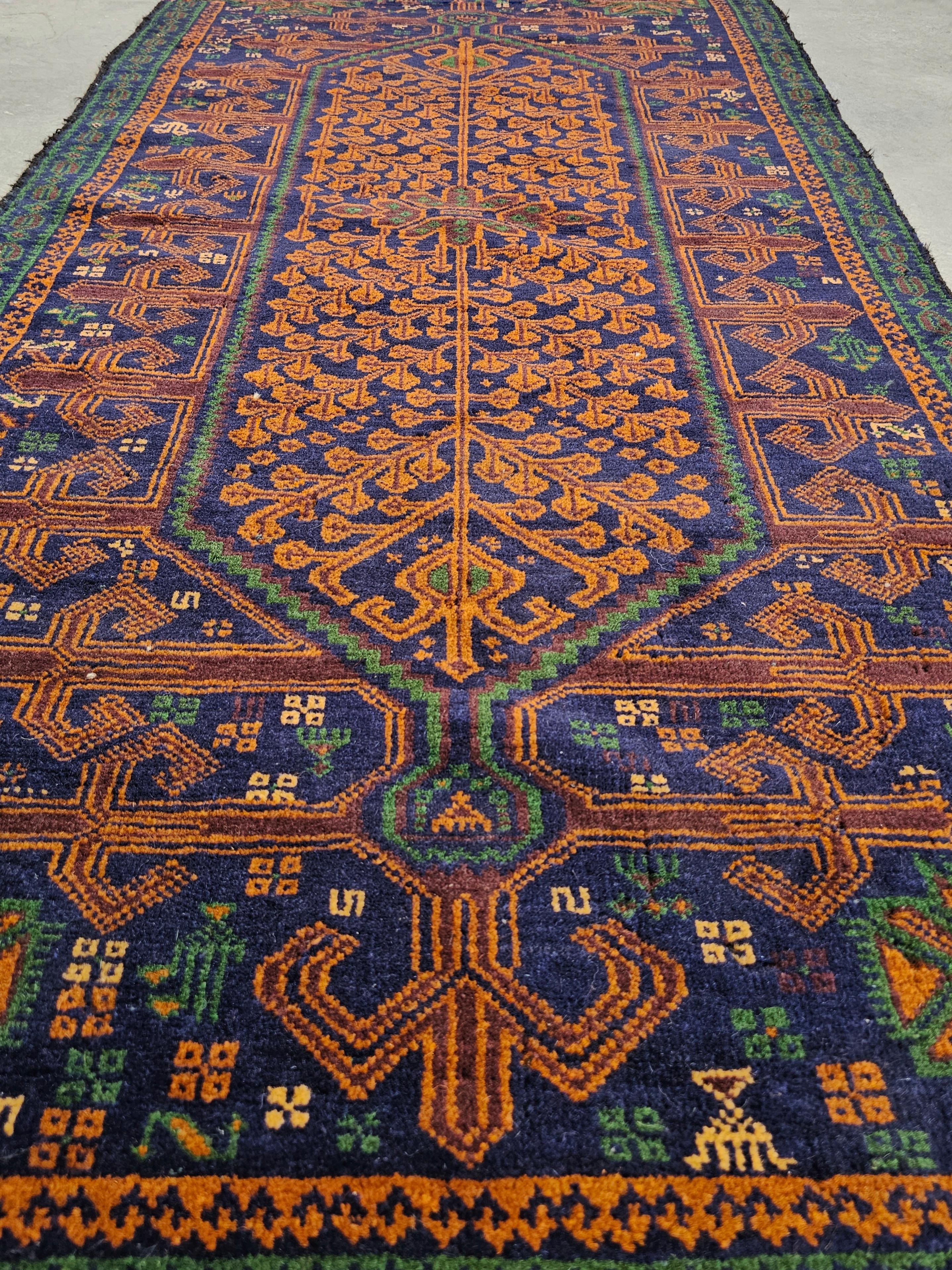 Vintage Hand-Knotted Baluch Rug with golden and navy tones, Afghanistan 1950s For Sale 1