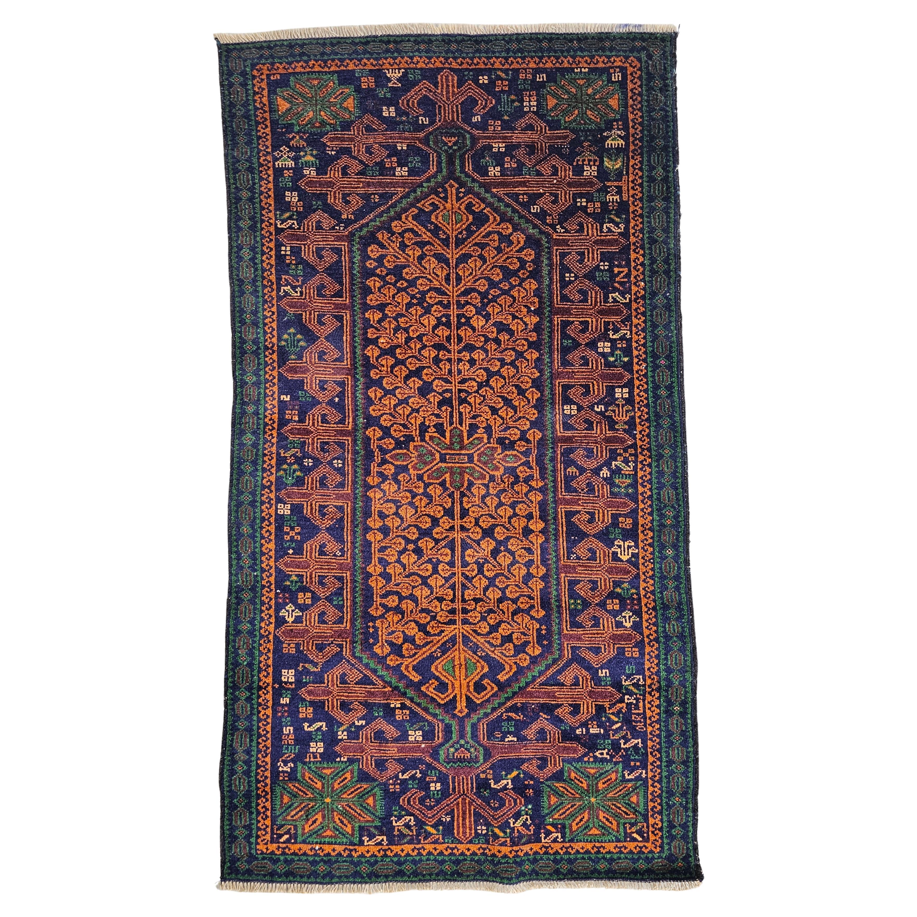 Vintage Hand-Knotted Baluch Rug with golden and navy tones, Afghanistan 1950s For Sale