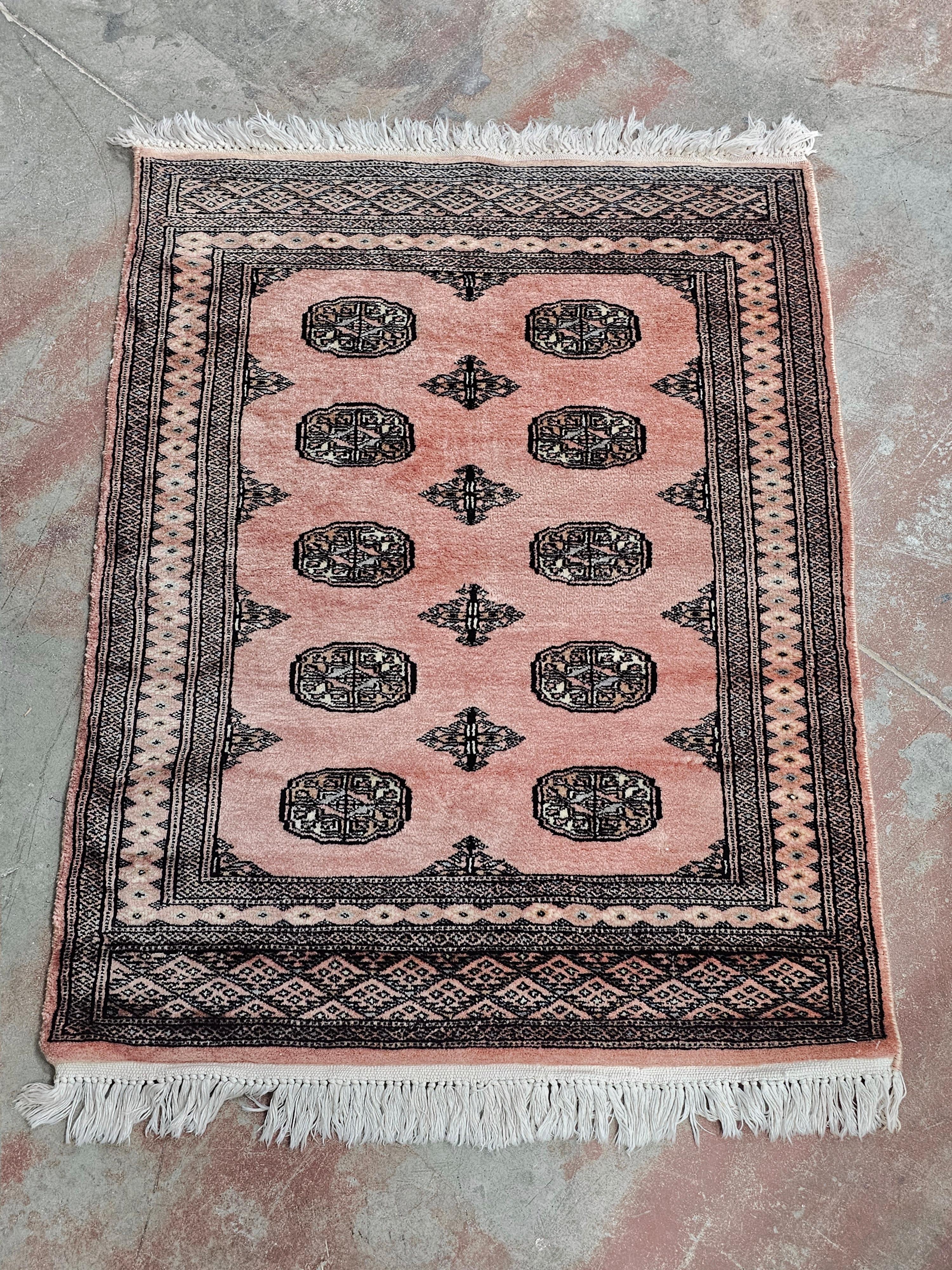 In this listing you will find a vintage Bokhara rug in very rare powder pink tone. It is a hand-knotted, 100% wool rug with high density knots. Made in Pakistan cca. 1950s.

Very good vintage condition with very few signs of time and use.

When