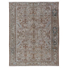 Vintage Hand-Knotted Heriz Rug with Sub-Geometric Design in Natural Tones