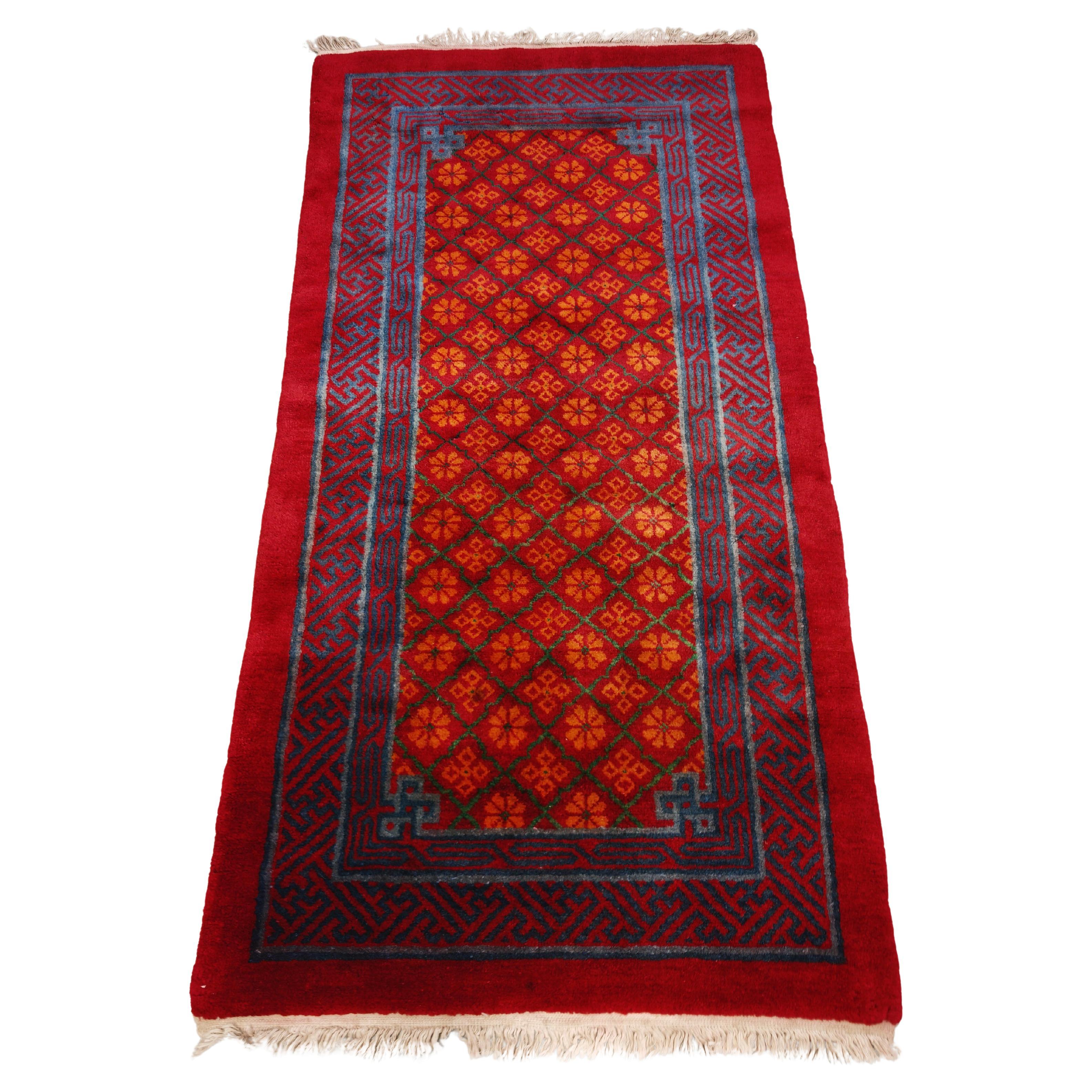 Handgeknüpfter Khotan-Teppich mit Blumenmuster, Ostturkestan 1960er Jahre im Angebot