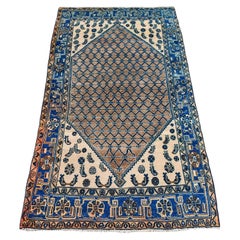Handgeknüpfter Perserteppich aus blauer und brauner Wolle mit geometrischem Muster