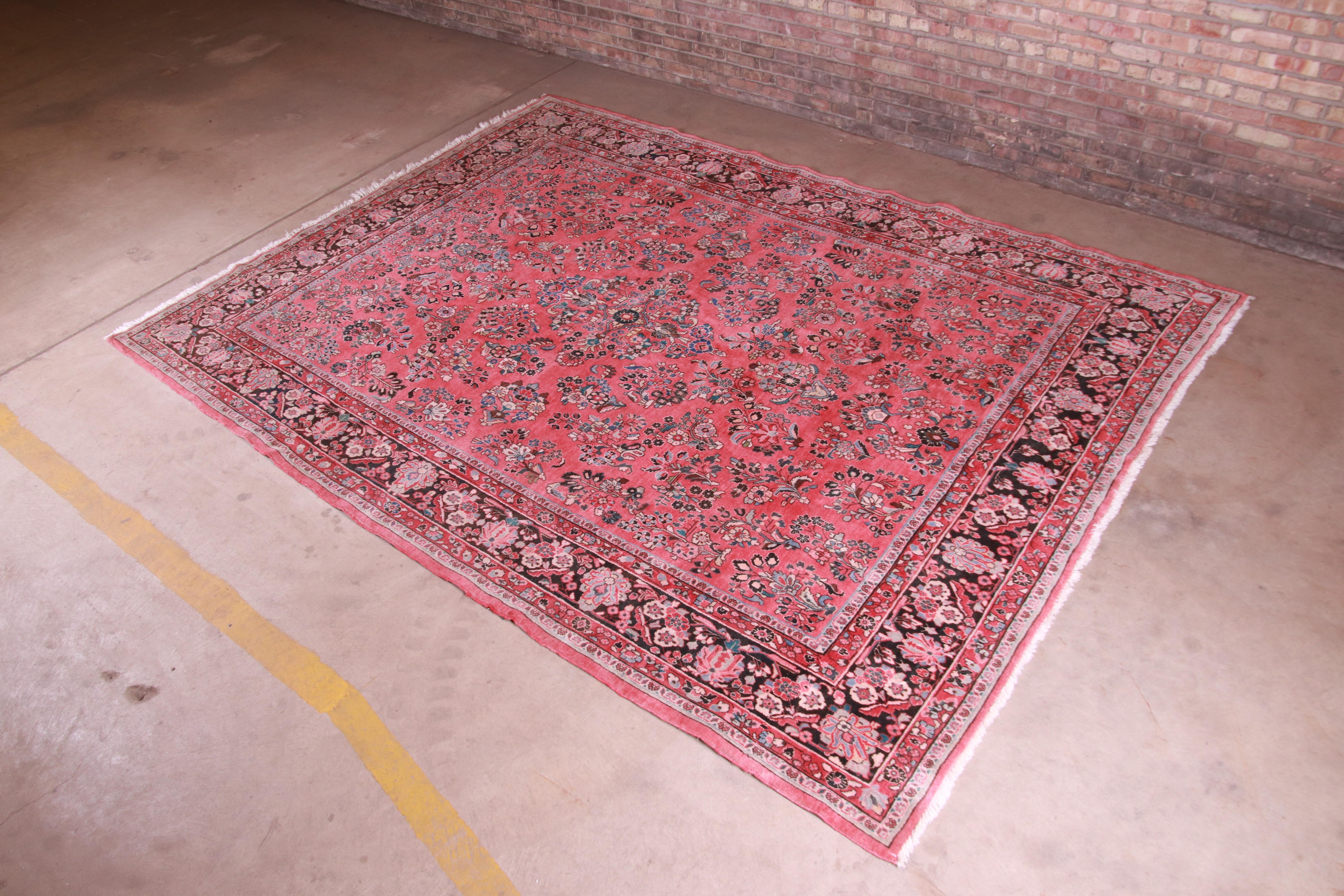 A gorgeous vintage hand knotted Persian Sarouk room size rug

Persia, mid-20th century

Classic design with floral sprays and bouquets

Measures: 8