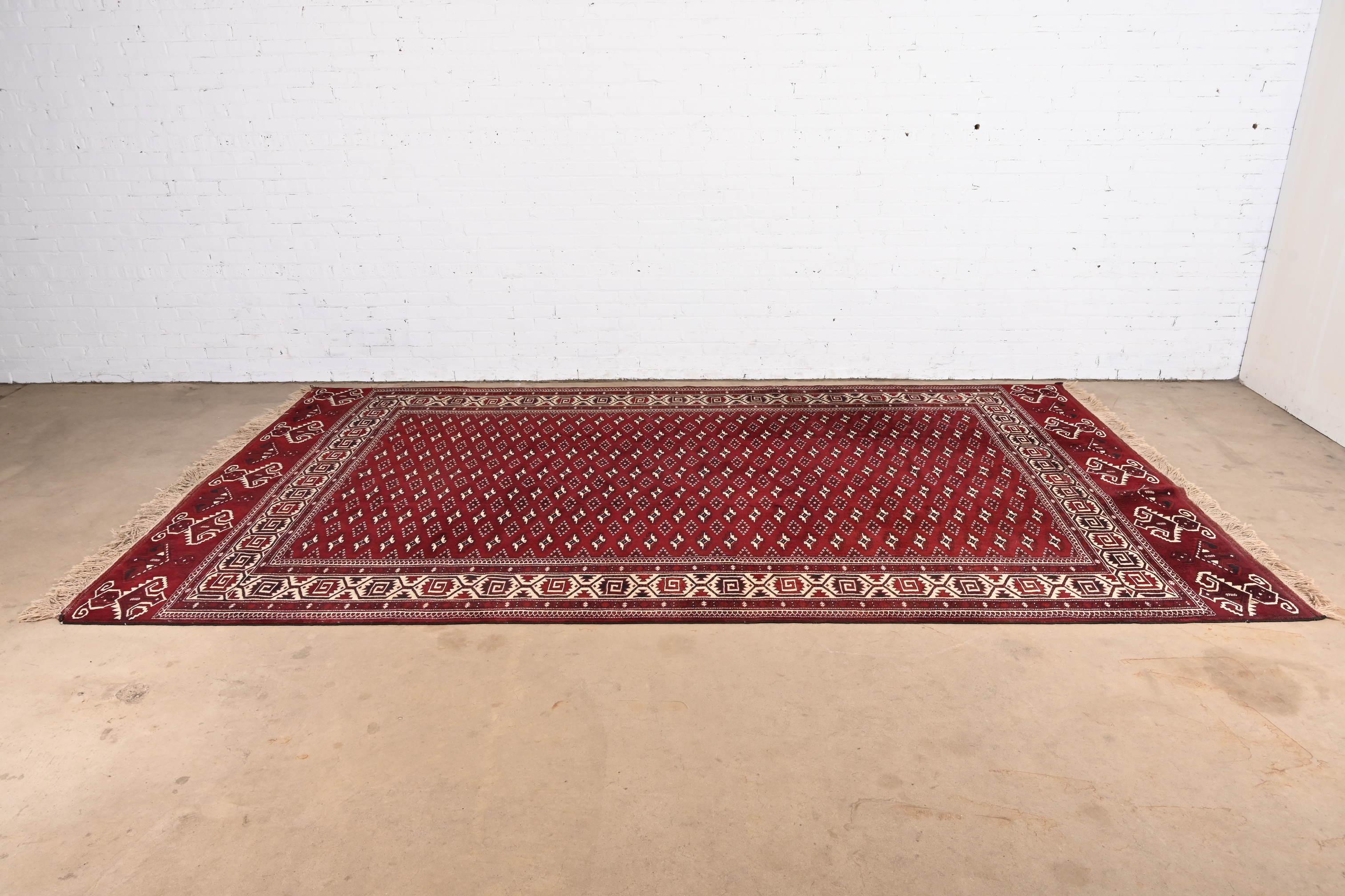 Mid-Century Modern Vintage Hand-Knotted Tribal Persian Bokhara Room Size Rug For Sale