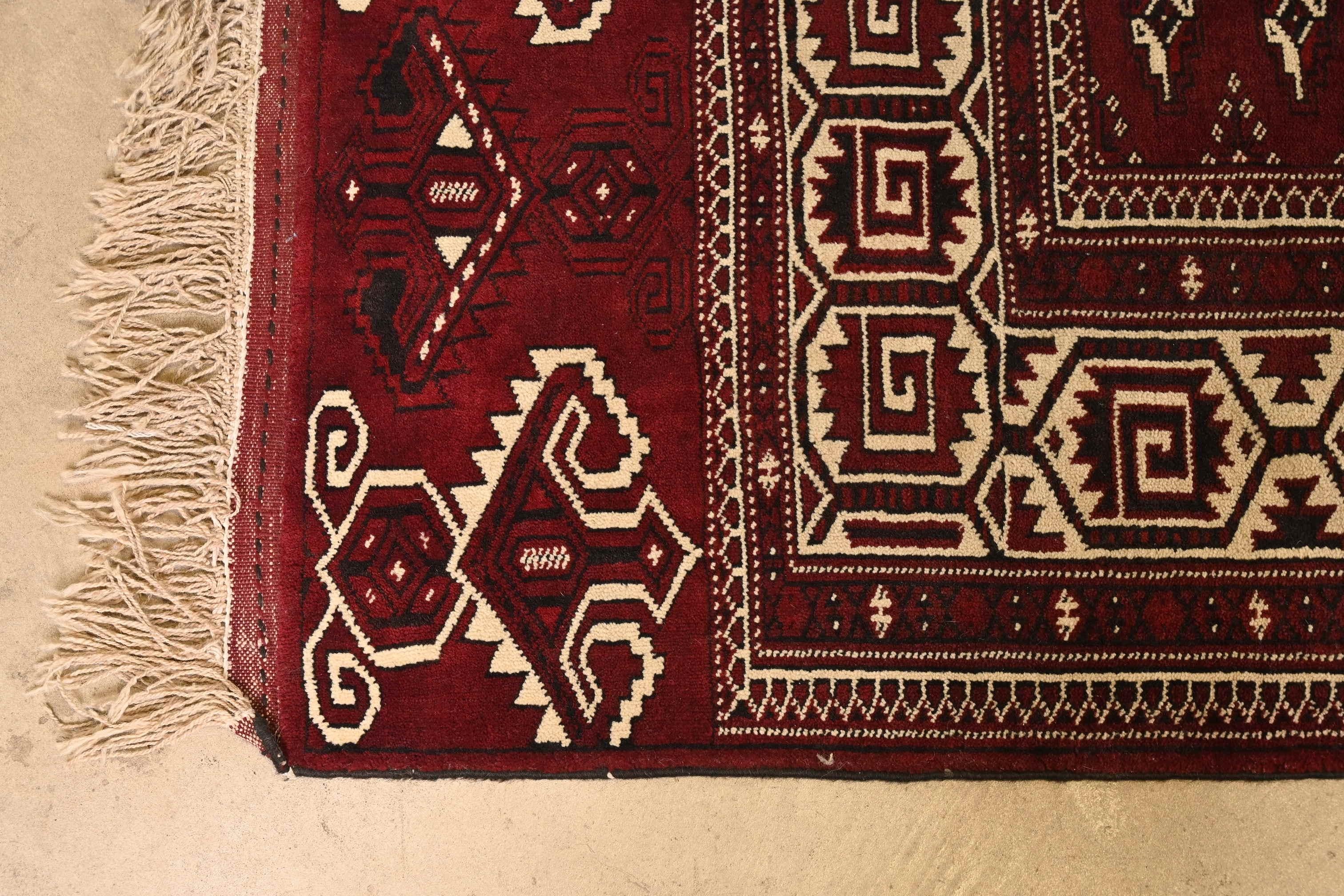 Vintage Hand-Knotted Tribal Persian Bokhara Room Size Rug In Good Condition For Sale In South Bend, IN