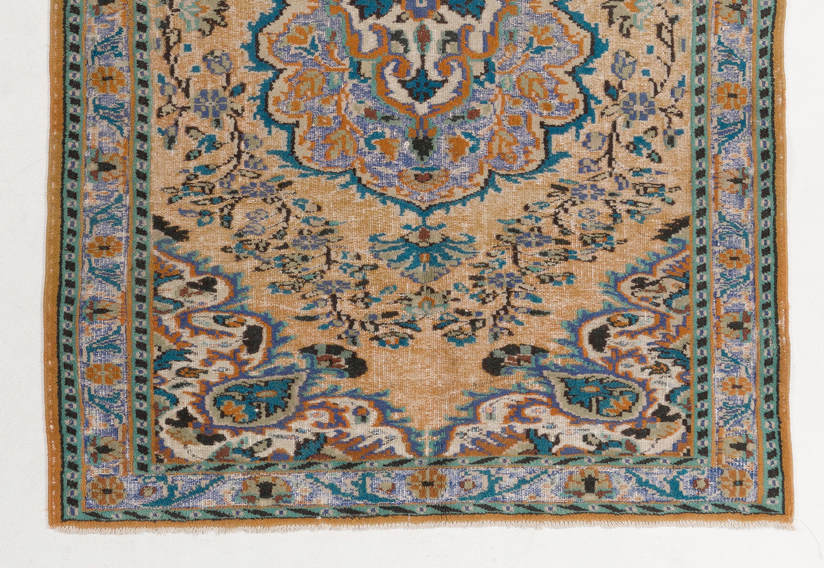Mid-20th Century Vintage Hand Knotted Turkish High and Low Pile Rug with a Medallion Design