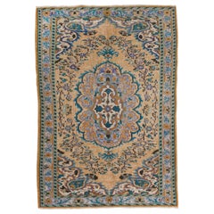 Vintage Hand Knotted Turkish High and Low Pile Rug with a Medallion Design