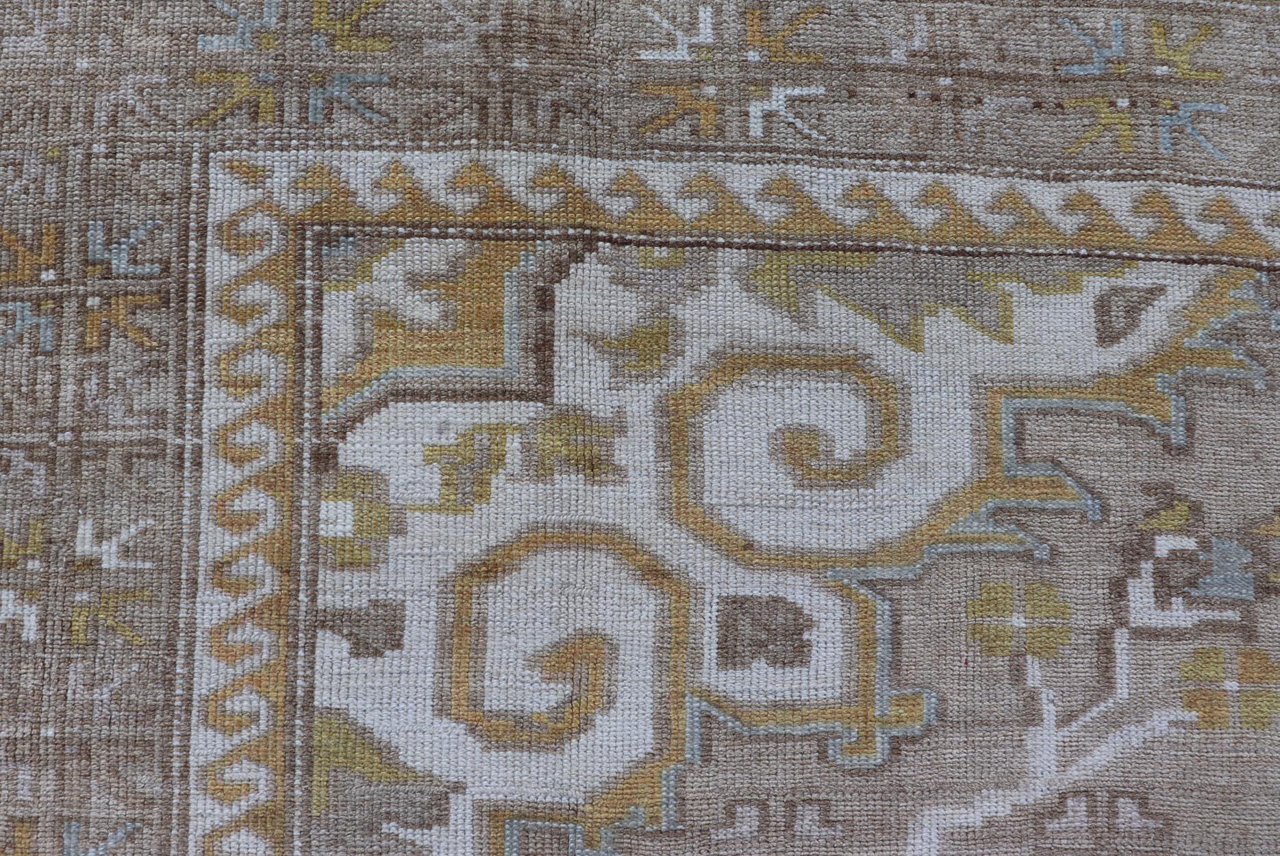 Wool Vintage Hand Knotted Turkish Oushak Kars in Earthy Tones and Yellow Colors For Sale