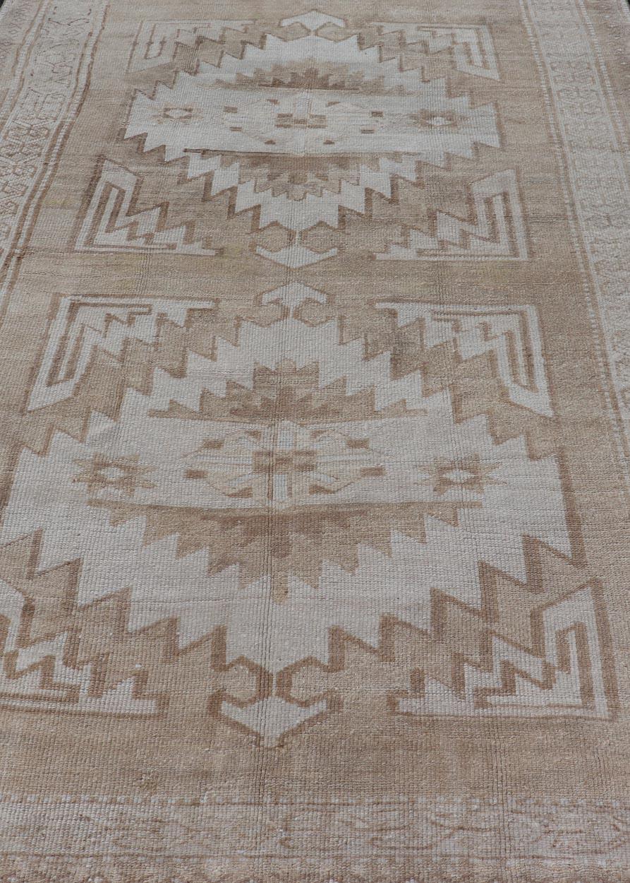 Persian Vintage Hand Knotted Turkish Oushak Kars in Muted Tones & Neutral Colors For Sale