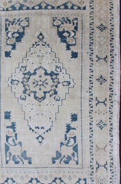 Vintage Hand Knotted Turkish Oushak Rug with Central Medallion in Blue and Cream