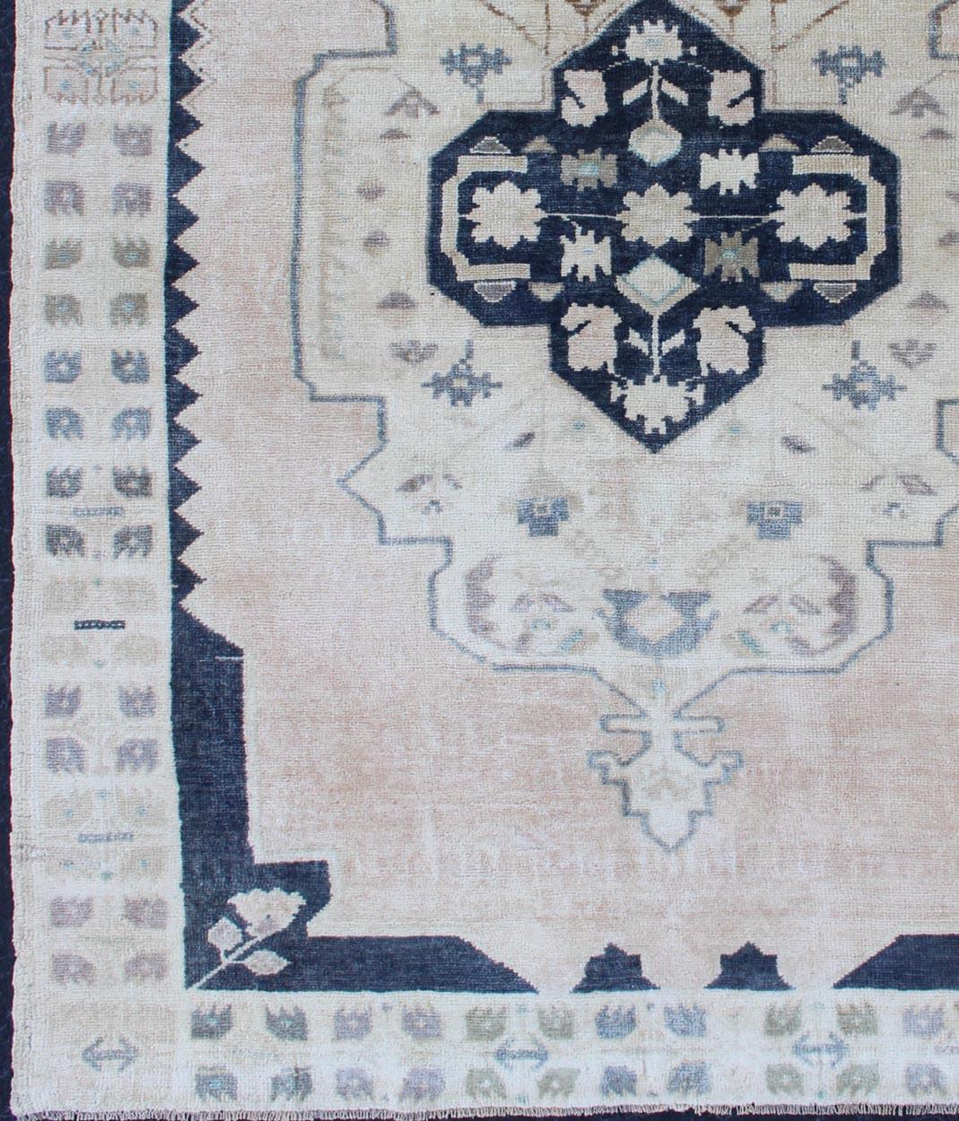 Hand-Knotted Vintage Hand Knotted Turkish Oushak Rug with Central Medallion in Blue and Cream For Sale