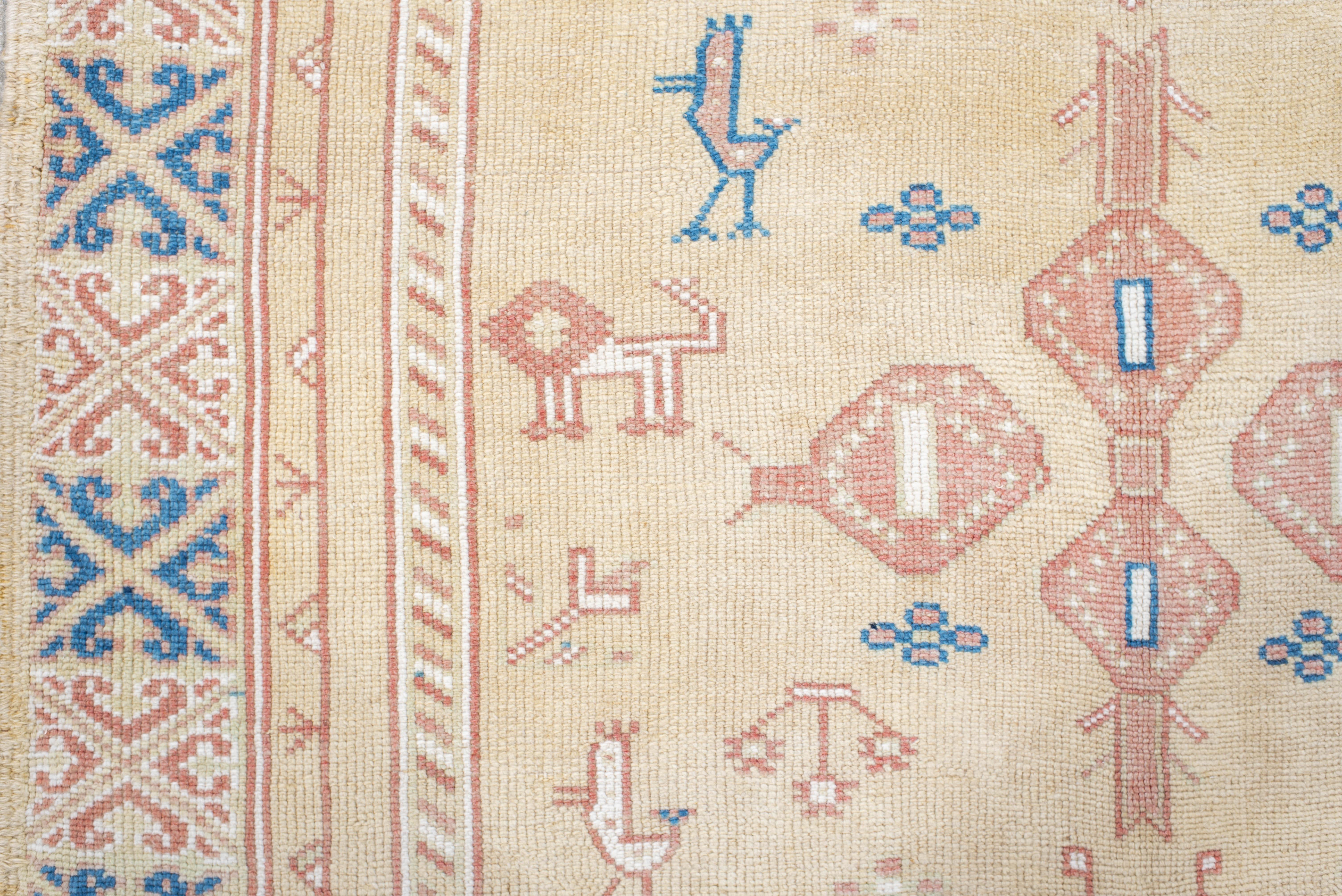 Wool Vintage Hand-Knotted Turkish Rug Animal and Cross Motifs For Sale