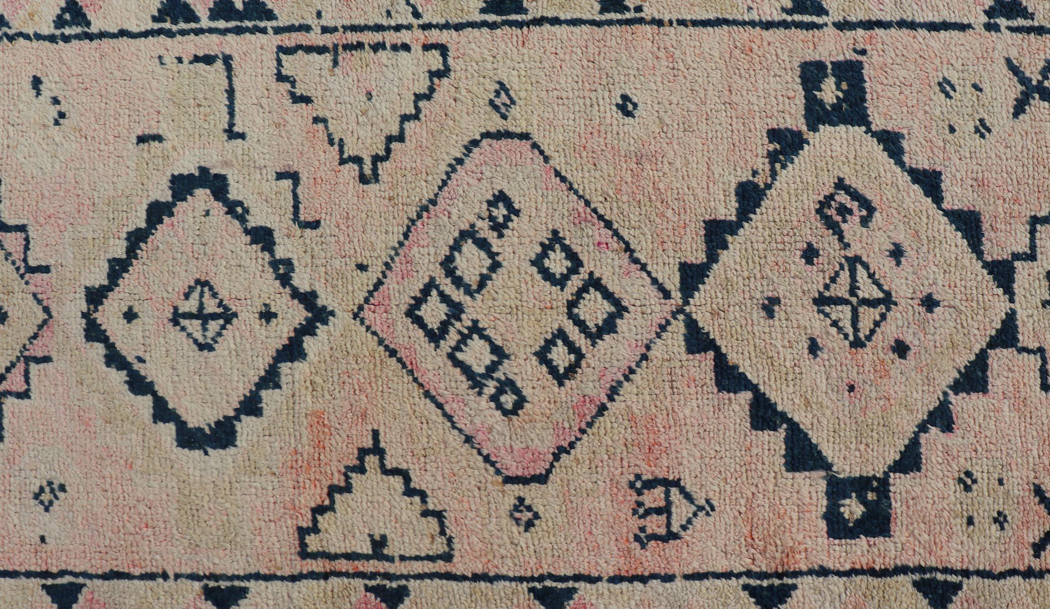 Vintage Turkish Hand Knotted Oushak runner with tribal motifs in blue and soft orange, Keivan Woven Arts / rug TU-MTU-161, country of origin / type: Turkey / Oushak, circa 1960
Measures: 2'10 x 11'8.