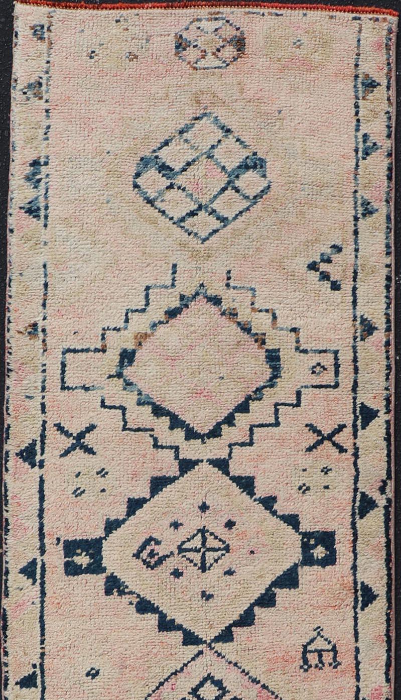 Oushak Vintage Hand Knotted Turkish Runner with Tribal Design in Muted Tones  For Sale