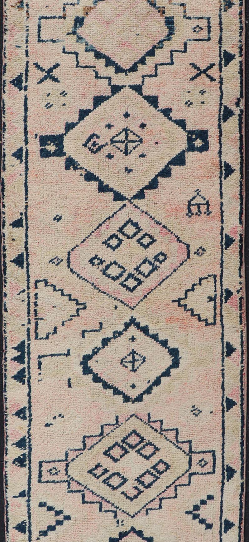 Hand-Knotted Vintage Hand Knotted Turkish Runner with Tribal Design in Muted Tones  For Sale