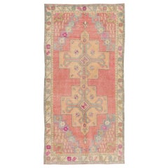 Vintage Hand Knotted Turkish Tribal Wool Area Rug in Coral Pink and Gold