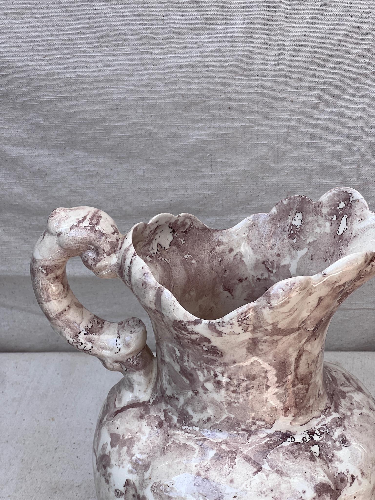 The 1980s vintage ceramic flower vase: hand-painted elegance reminiscent of marble in a subtle purple and white palette.
(a drainage hole is existing)