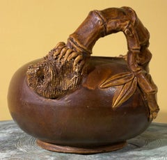 Vintage hand painted and glazed ceramic artistic jar