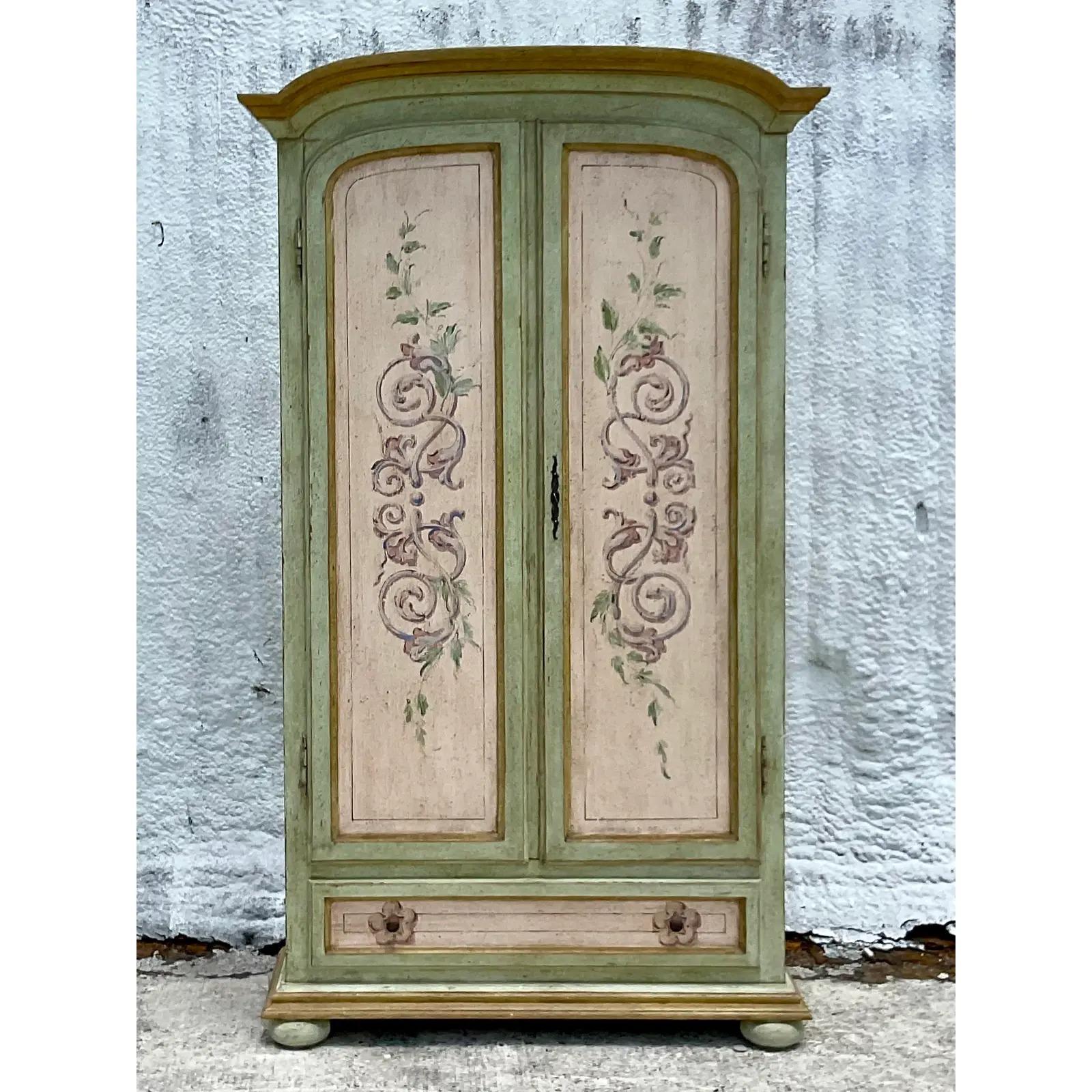 Fantastic vintage Boho armoire. Beautiful hand painted cabinet in pale greens and purples. Perfect for you to use as a linen closet, toy storage or POOL cabana house towels. Acquired from a Palm Beach estate.