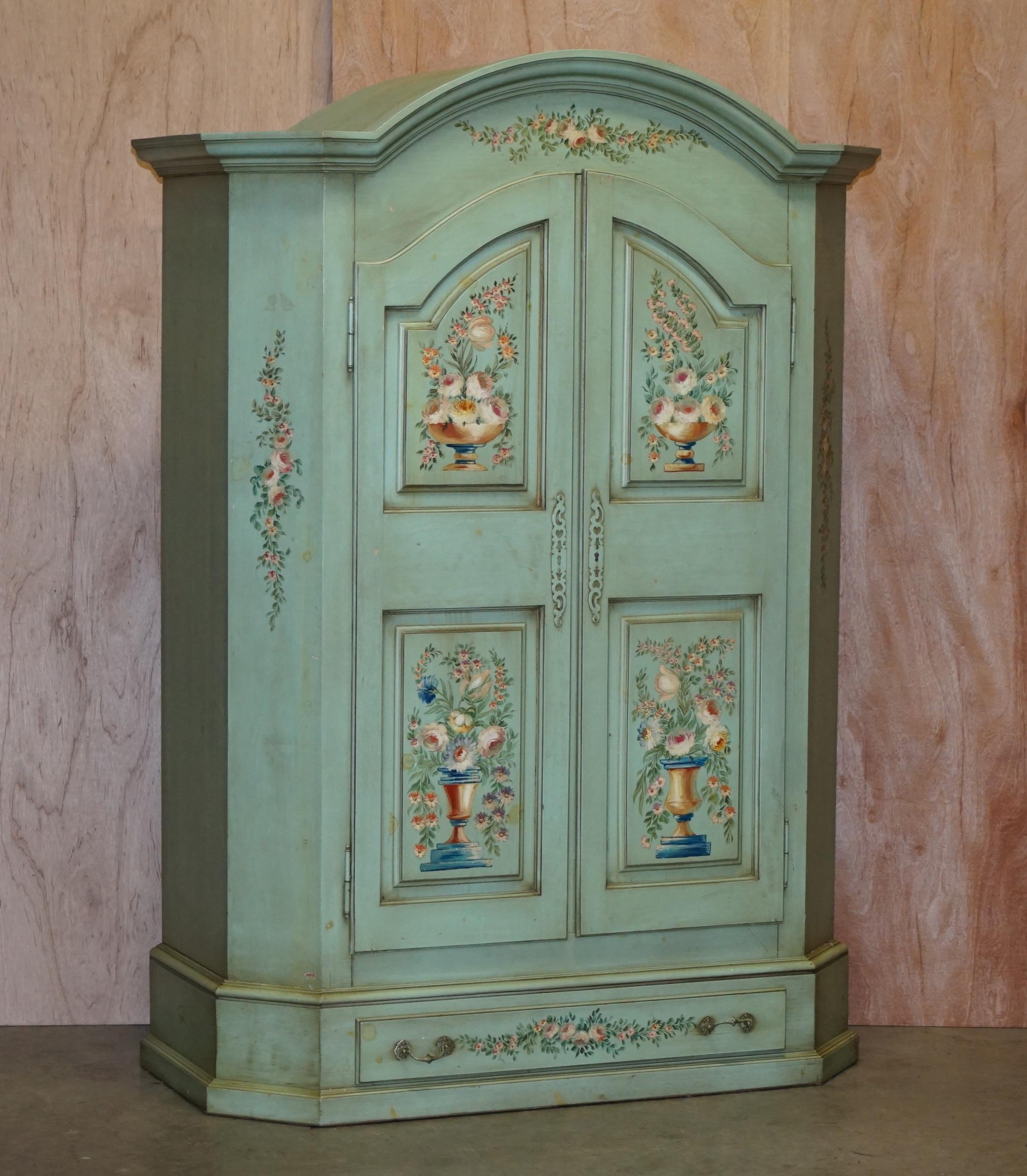 We are delighted to offer this lovely 18th century style hand painted duck egg blue wardrobe with floral detailing.

A very good looking well made and decorative wardrobe. It’s based on a Swedish 18th century design that was originally used on