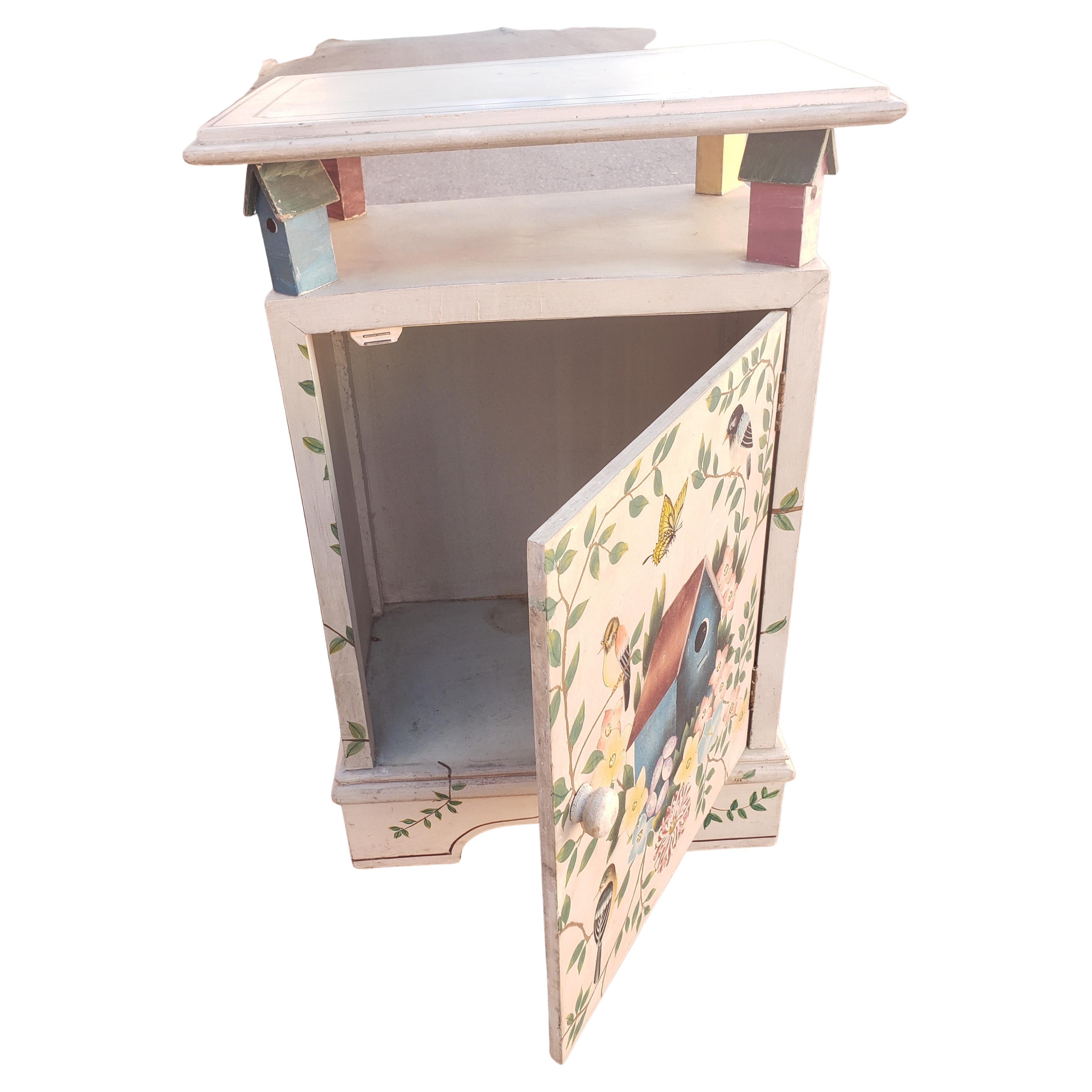 Hand painted vintage cabinet stand. Measures 19.75
