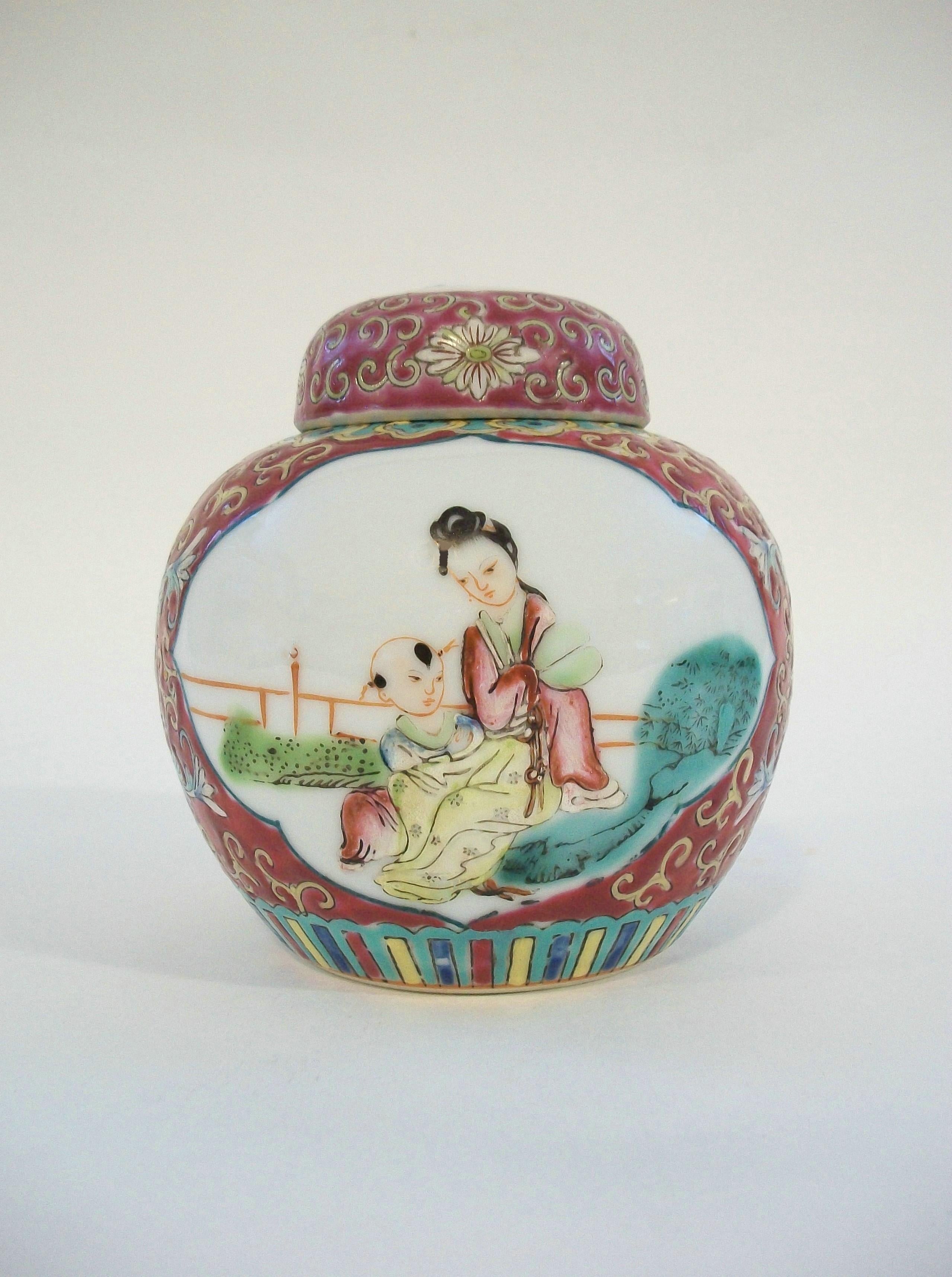 Vintage porcelain ginger jar with lid - famille rose decoration with hand painted scenic panels to the front and back - turquoise bands to the top and bottom of the jar - unsigned - China - mid 20th century.

Excellent vintage condition - minor